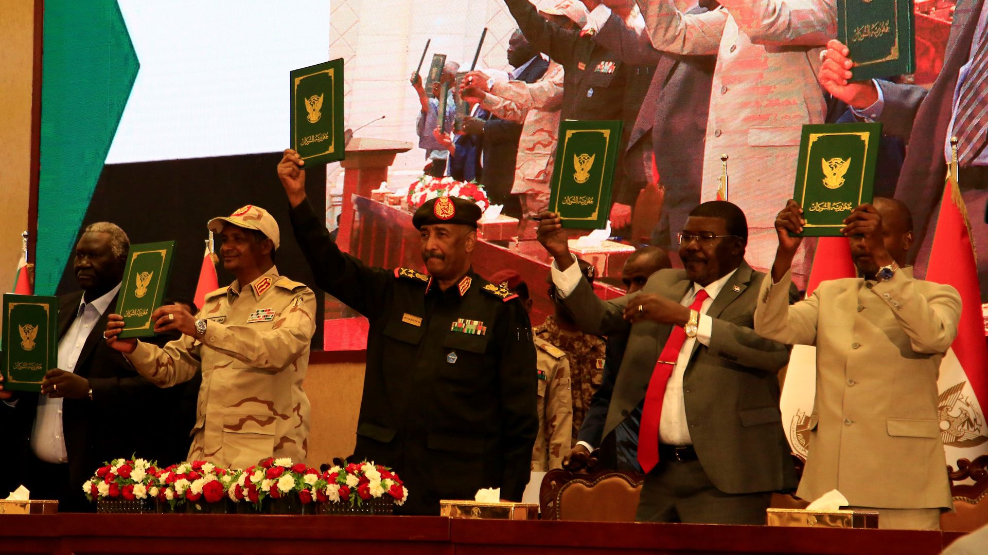 Sudan's military and civilian leaders are seen at the signing ceremony of a political framework agreement in Khartoum, Sudan, Dec. 5, 2022. 