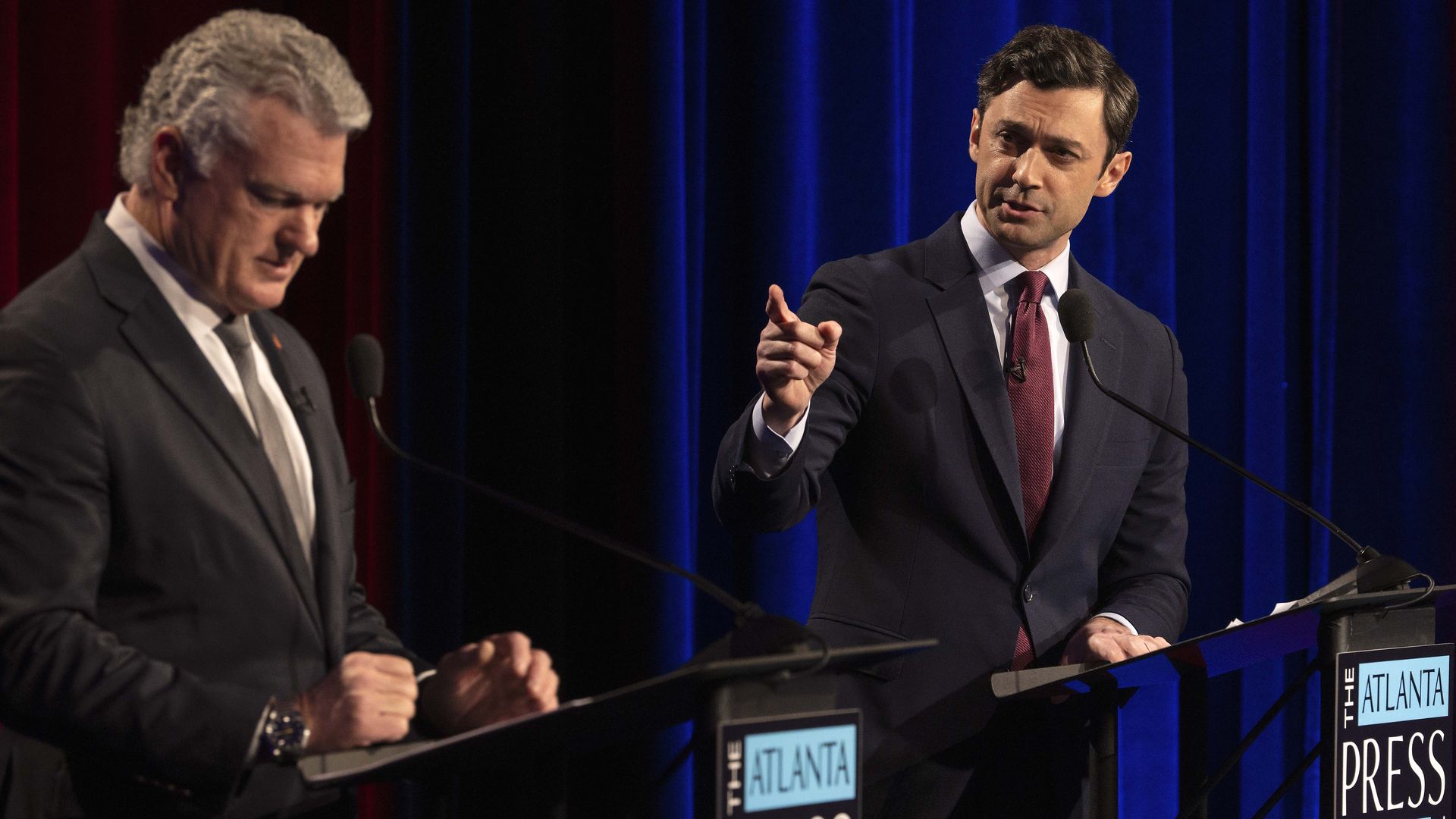 Sen. Jon Ossoff (D-Ga.) and Rep. Mike Collins (R-Ga.), the Republican Senate challenger, debate in Atlanta last night.