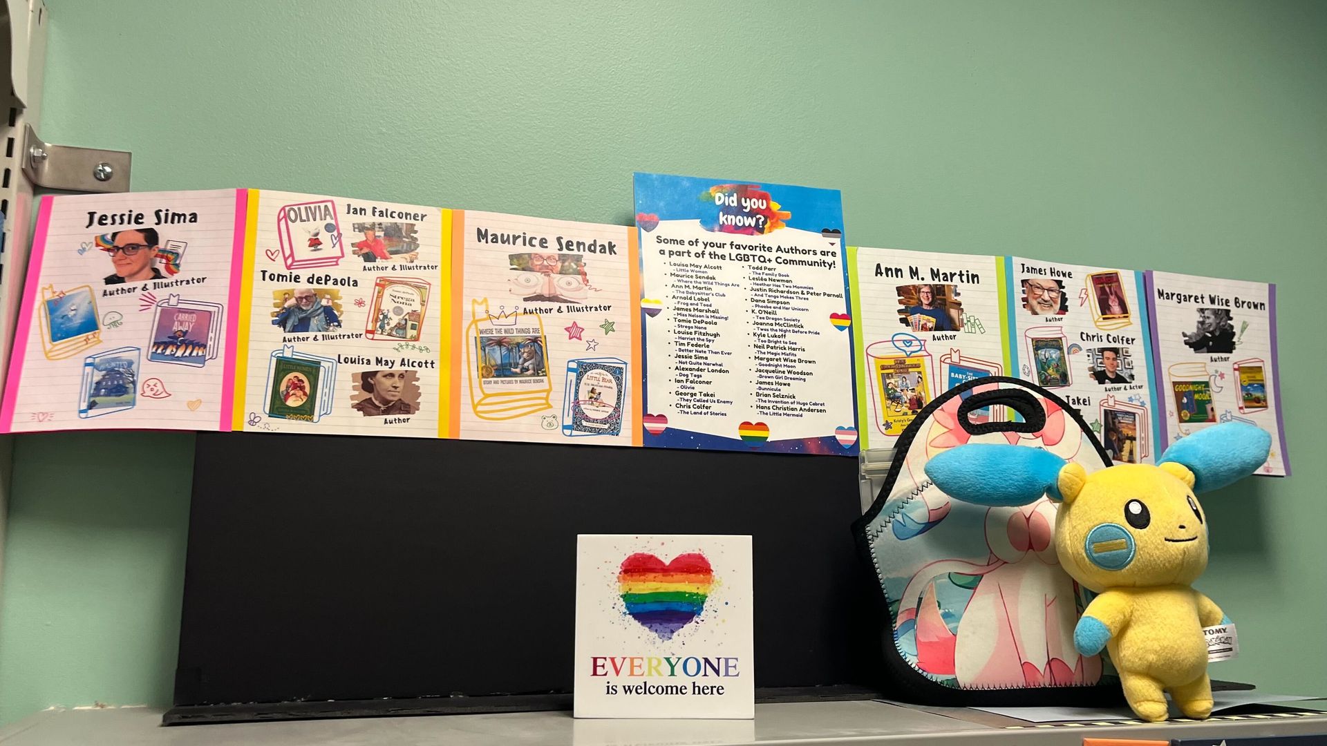 A display at the Palm Harbor Library identifies authors who are members of the LGBTQ+ community.