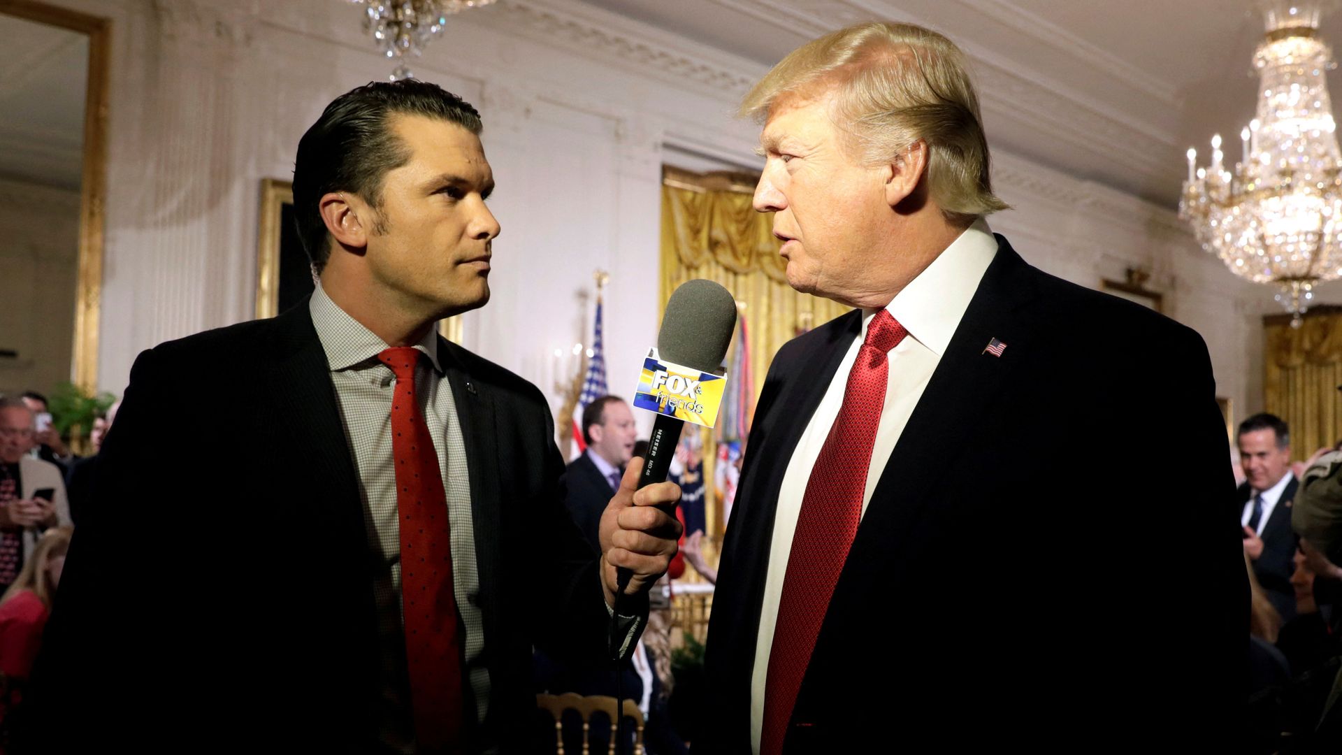 Pete Hegseth interviews President Trump at the White House in 2017. Photo: Kevin Lamarque/Reuters