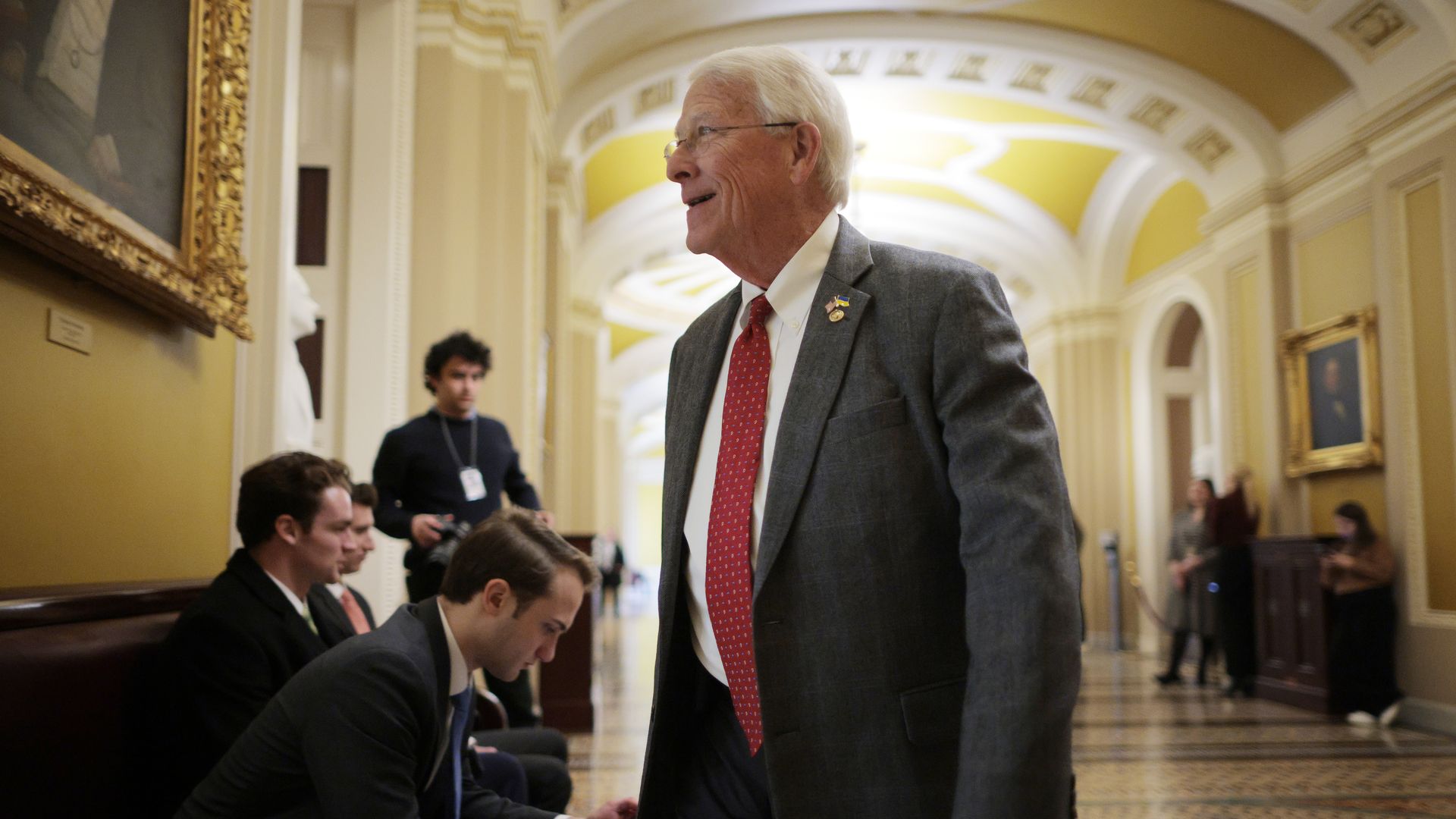 Roger Wicker walks in a Senate corridor.