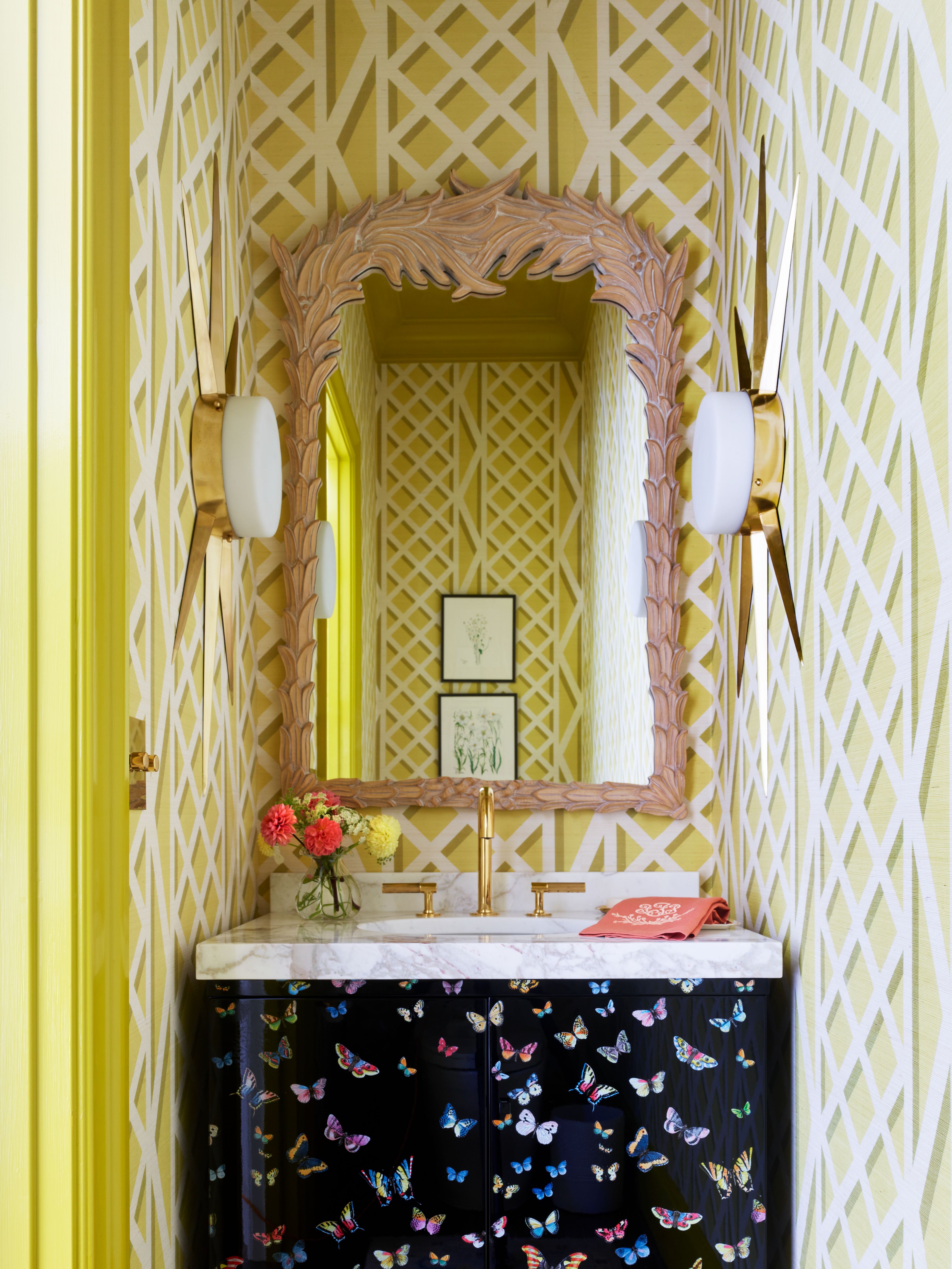 powder bathroom with lemongrass wallpaper and a butterfly sink