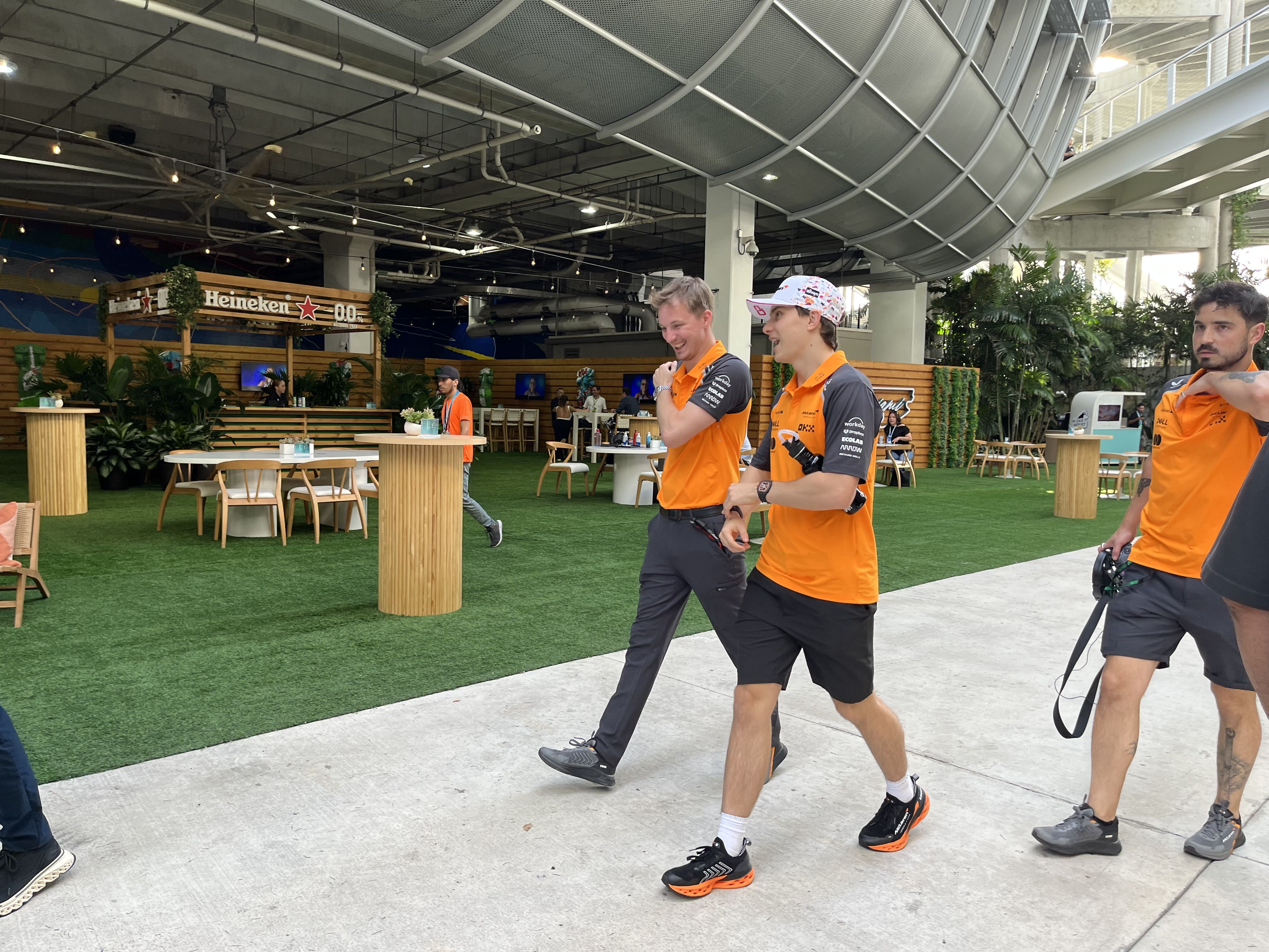 Oscar Piastri (center) an F1 driver for McLaren