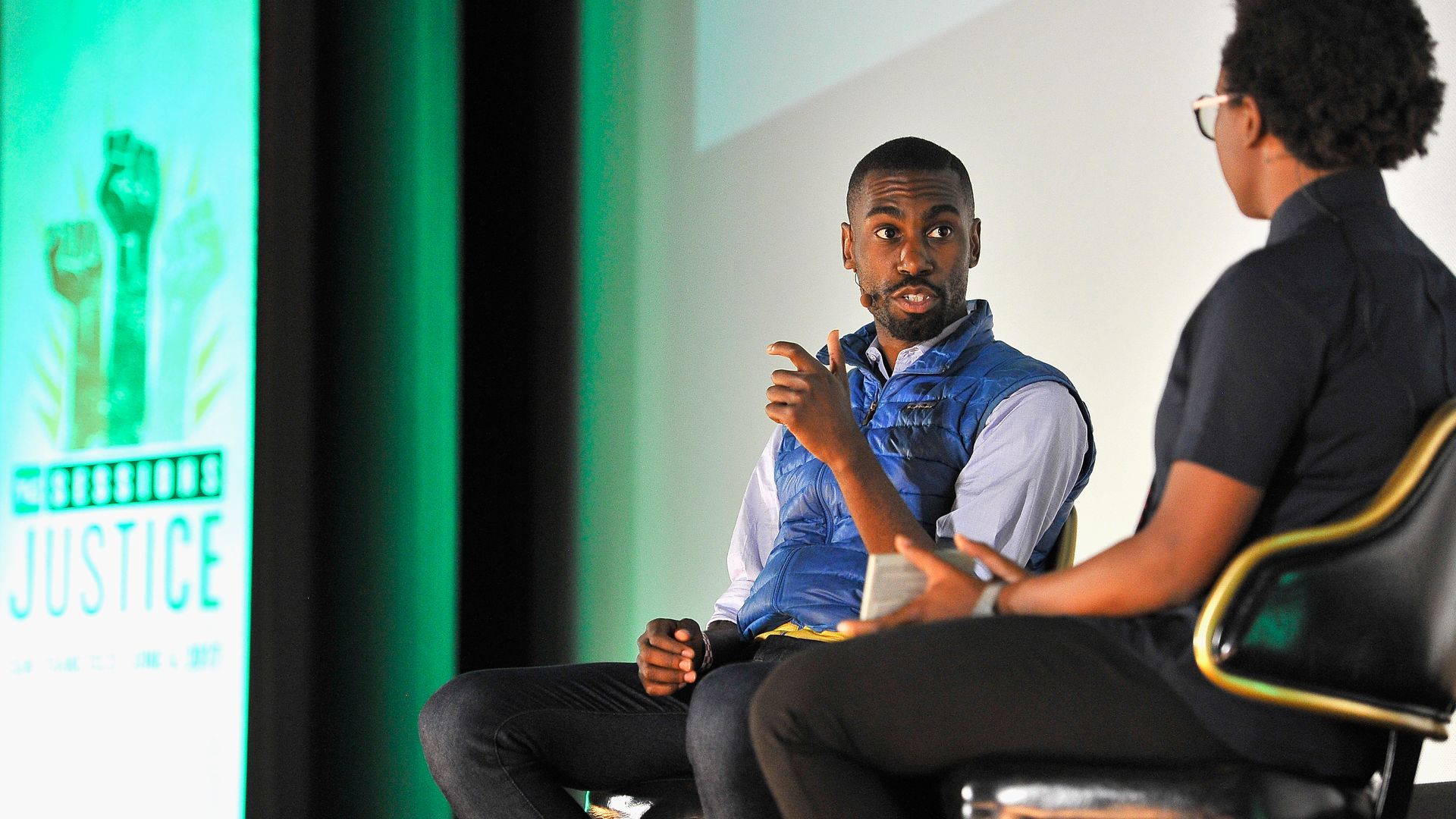 Photo of Deray McKesson in a panel discussion