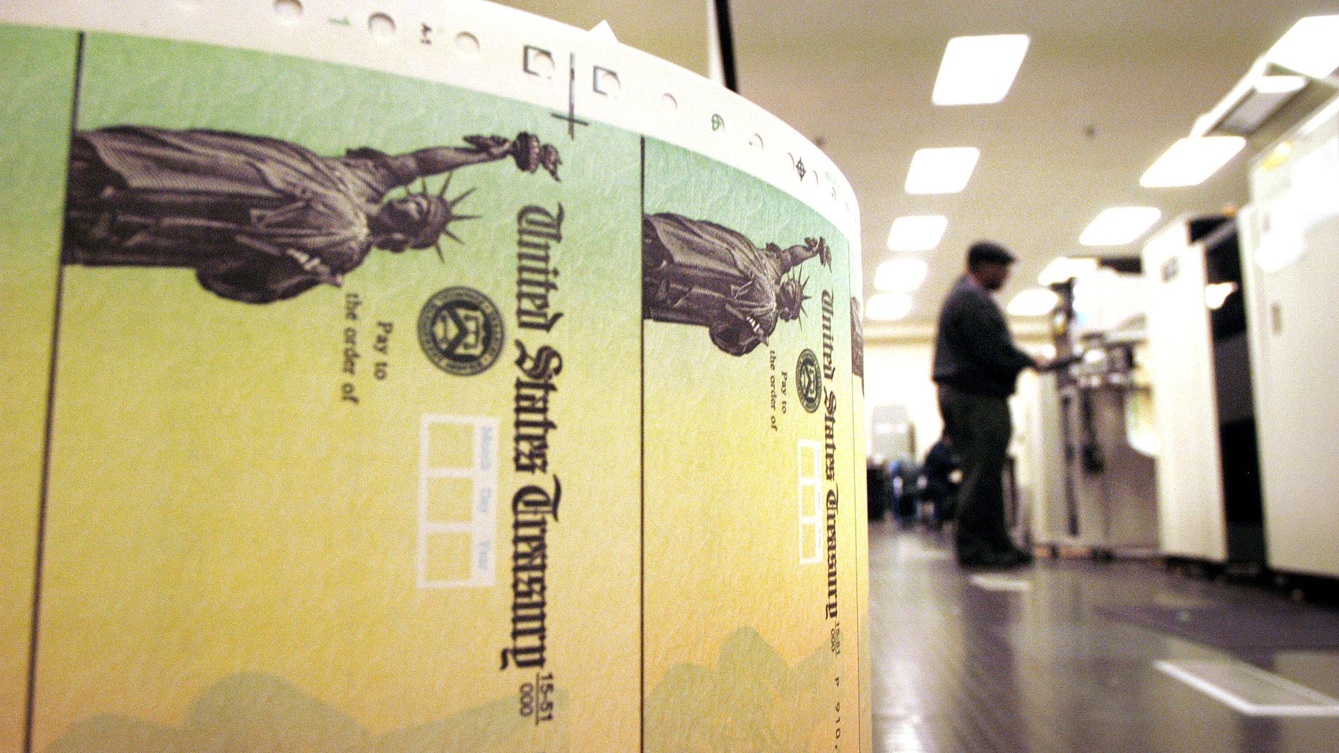 Blank Social Security checks are run through a printer at the U.S. Treasury printing facility February 11, 2005 in Philadelphia, Pennsylvania. 