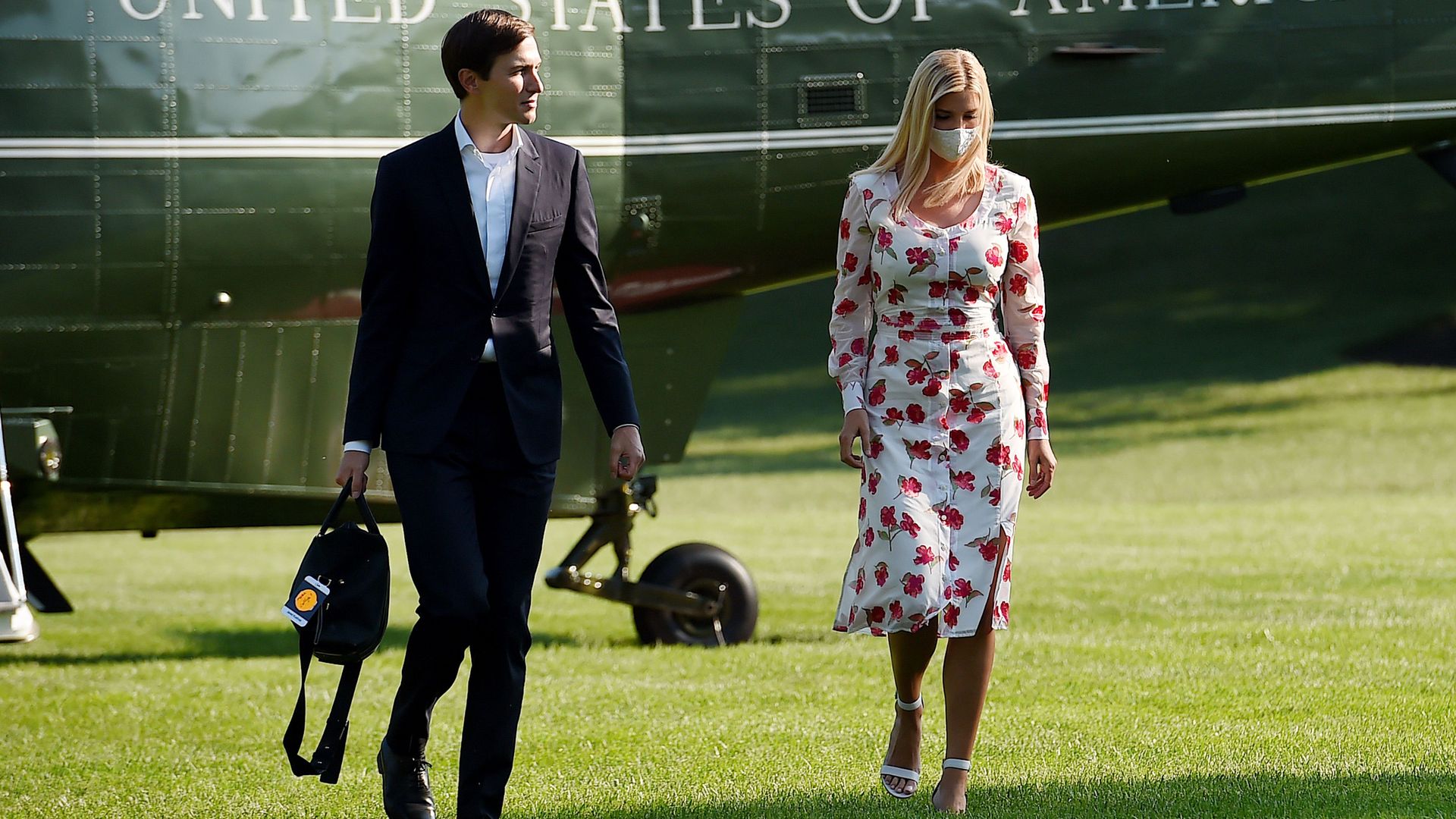 Ivanka Trump, senior adviser to President Trump (R), and Jared Kushner, senior White House advisor, walk off Marine One at the White House in Washington, DC, July 26
