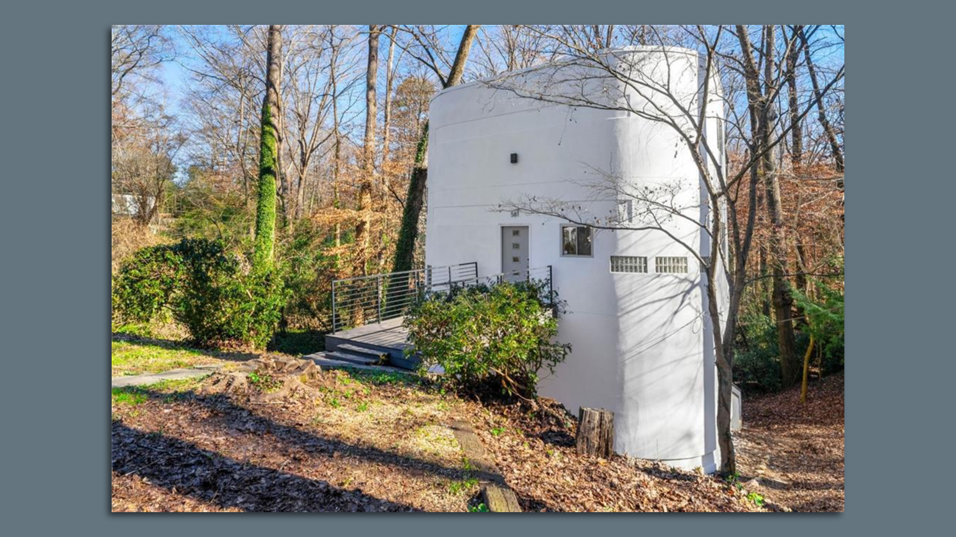 A white modern art deco home for sale at 581 Harold Ave NE in Atlanta. Photo: Courtesy of  Drew Jackson/Park Realty