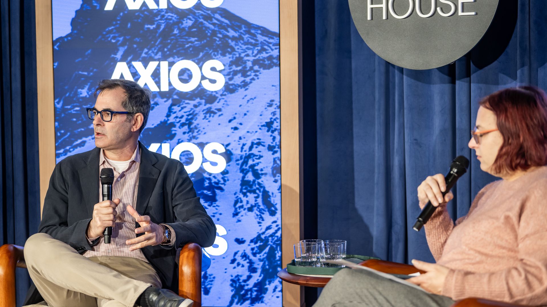 CoreWeave's Mike Intrator speaks to Axios' Ina Fried on stage at Axios House in Davos.