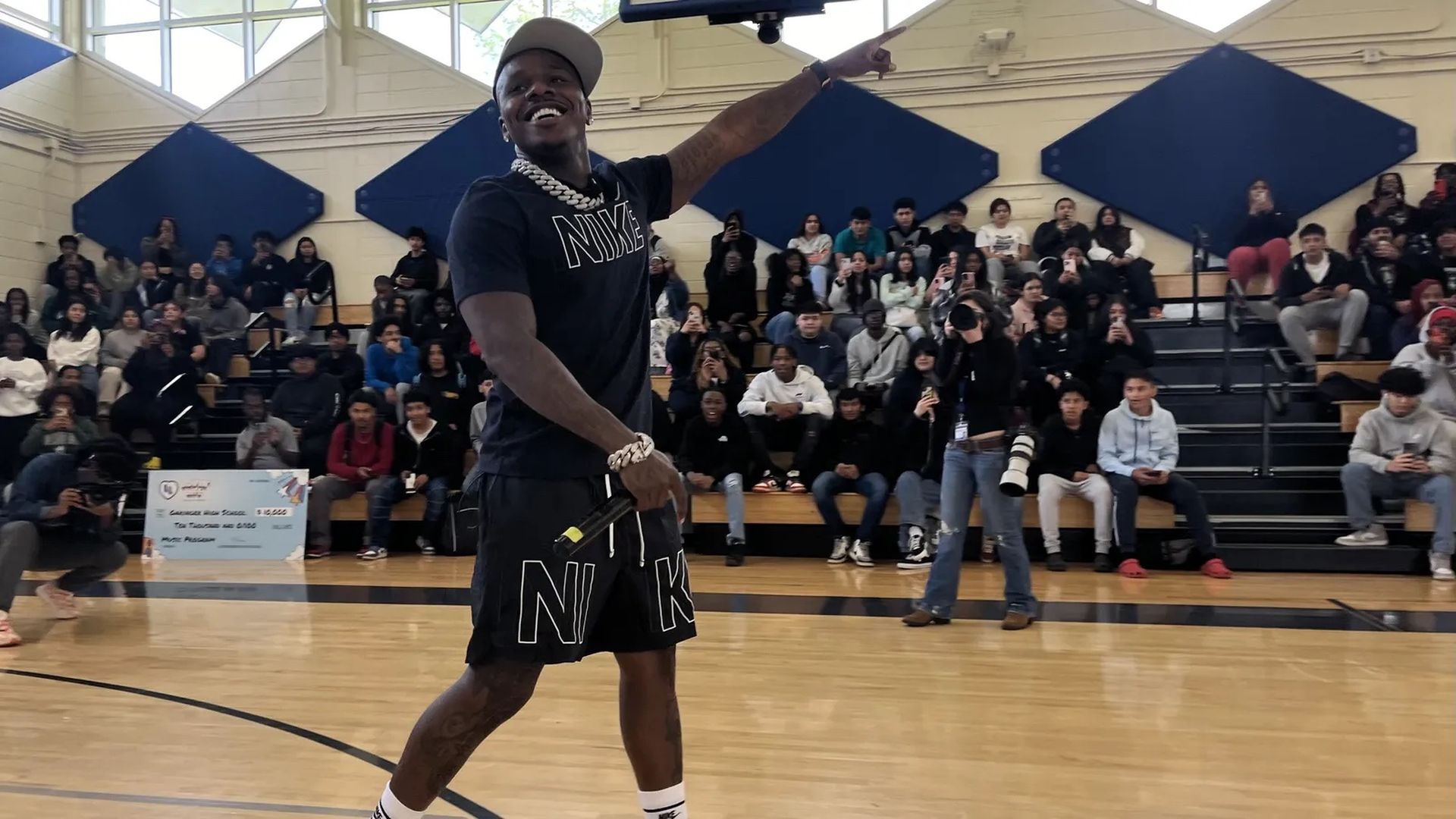 Da Baby inside a high school gym