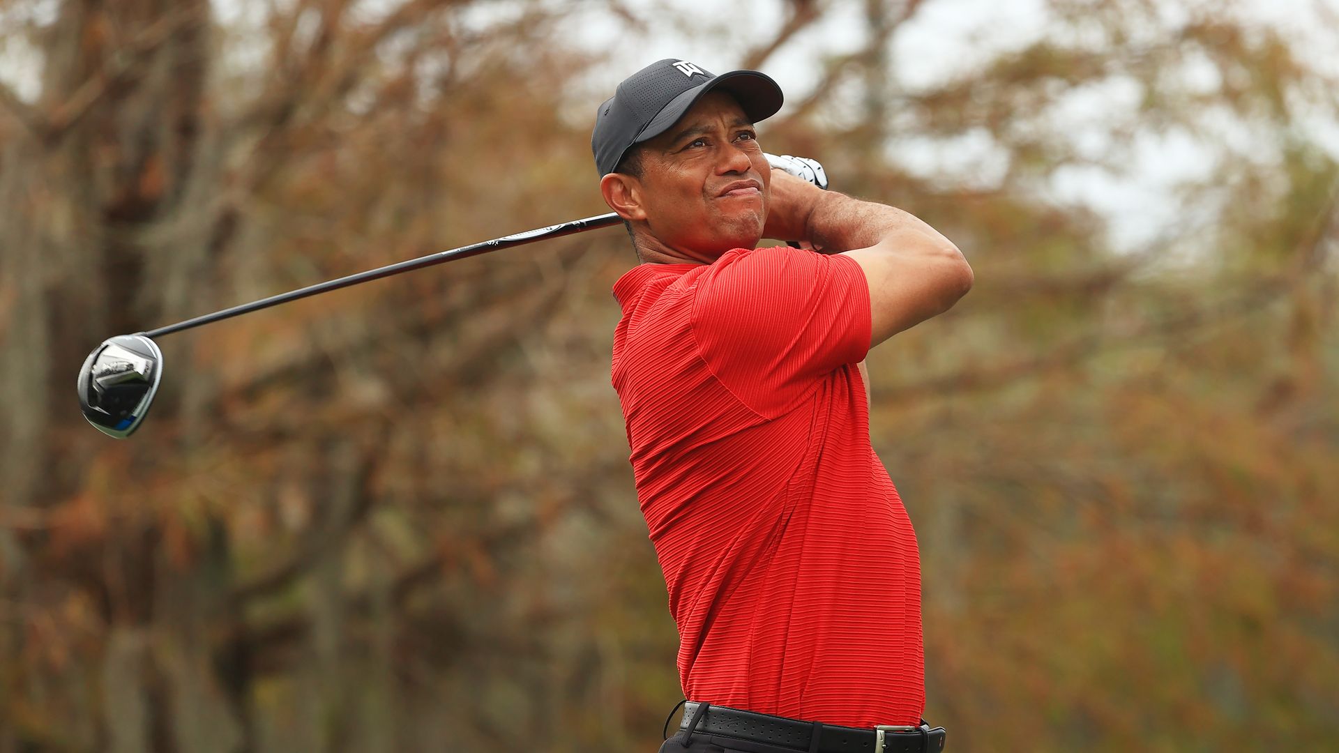 Tiger Woods golfing at the Ritz-Carlton Golf Club Orlando in December 2020.