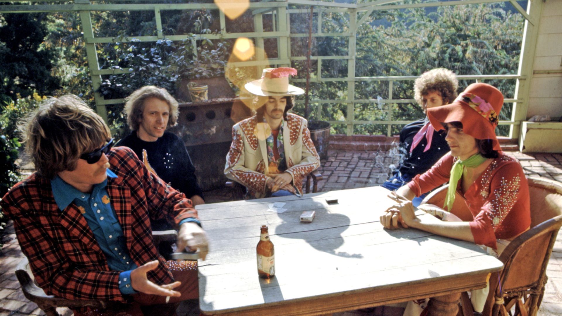 The Flying Burrito Brothers pose for a photo wearing Nudie Suits in 1969. 