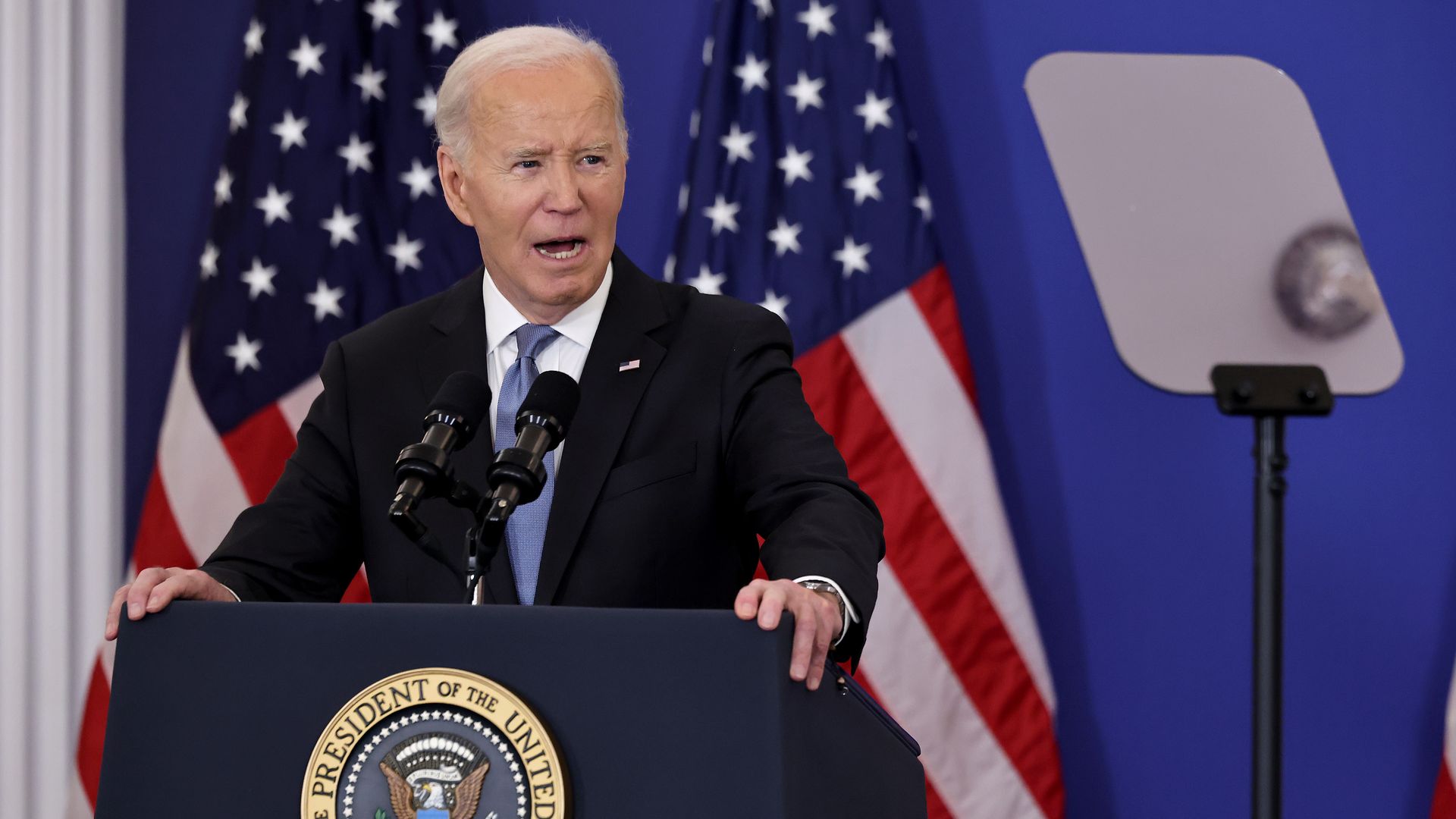 Joe Biden delivers a speech about his foreign policy achievements in the Ben Franklin Room at the State Department's Harry S. Truman headquarters building on January 13,