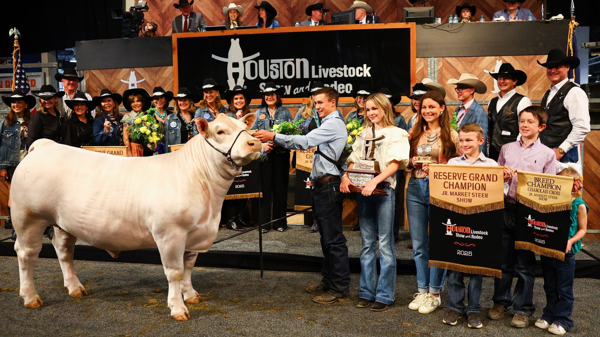 Jett Hale stands with his steer Mike