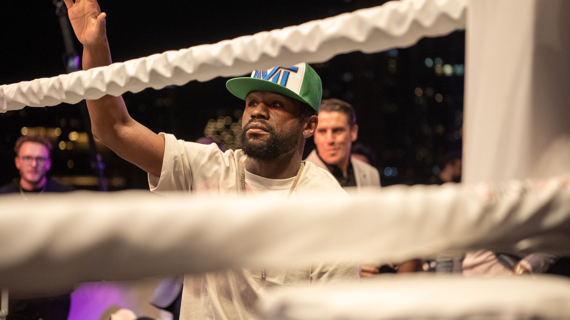 Floyd Mayweather seen through the ropes of a boxing ring. 