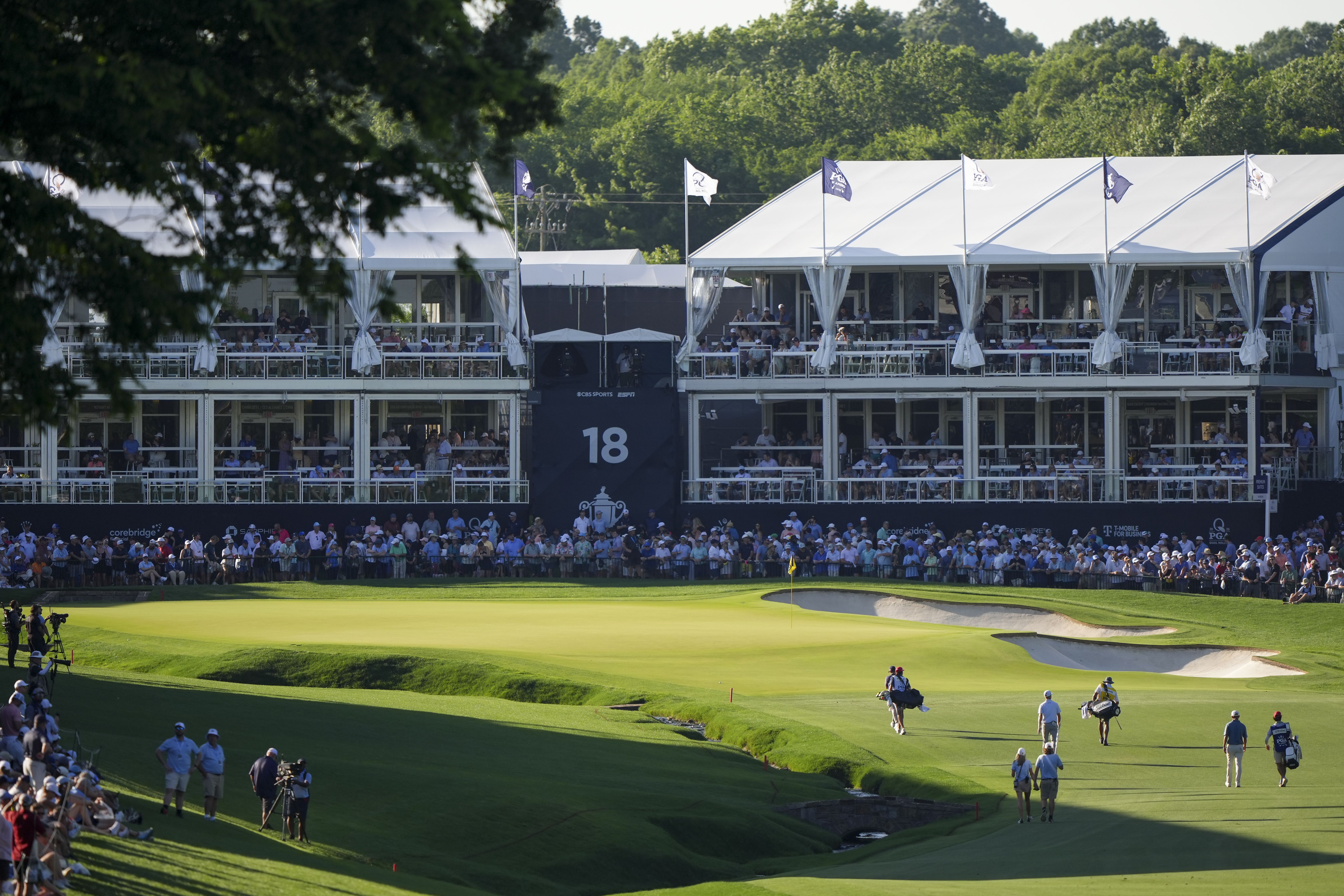 Sam Stevens and his group approach the 18th hole putting green during the third round of the PGA Championship at Quail Hollow Club on Saturday, May 17, 2025 in Charlotte, North Carolina. (Photo by Darren Carroll/PGA of America via Getty Images)