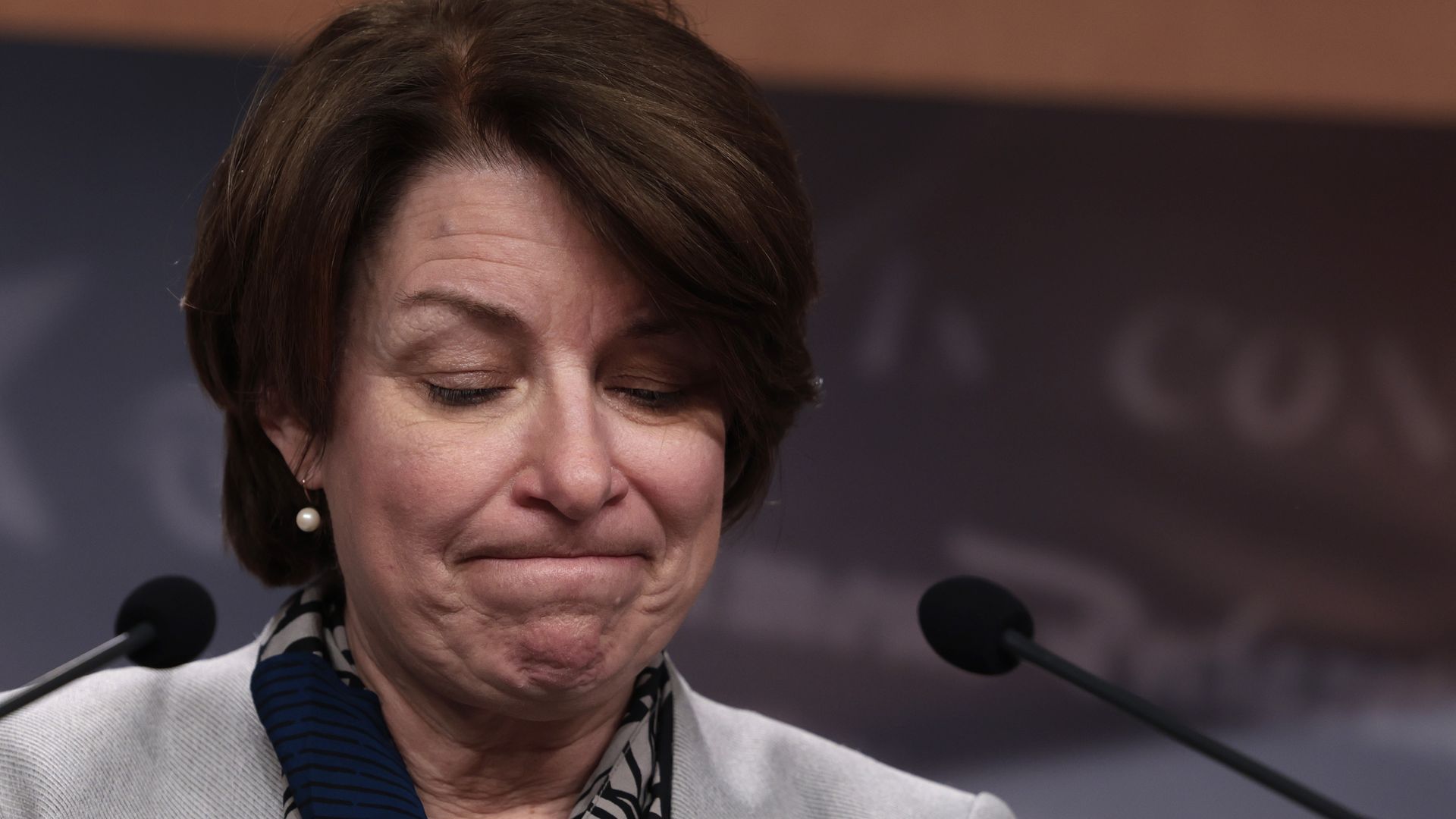 Photo of Sen. Amy Klobuchar's face with her lips pursed