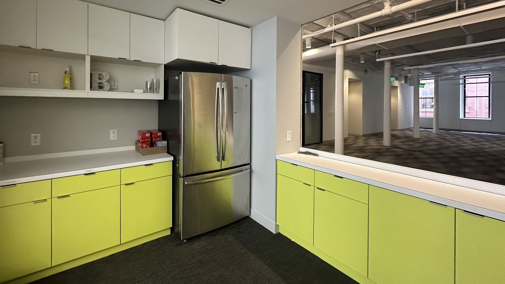 A kitchen in the middle of an empty third-floor of the building recently bought by the nonprofit BreakTime. It will become a "resource hub" for young adults experiencing homelessness.
