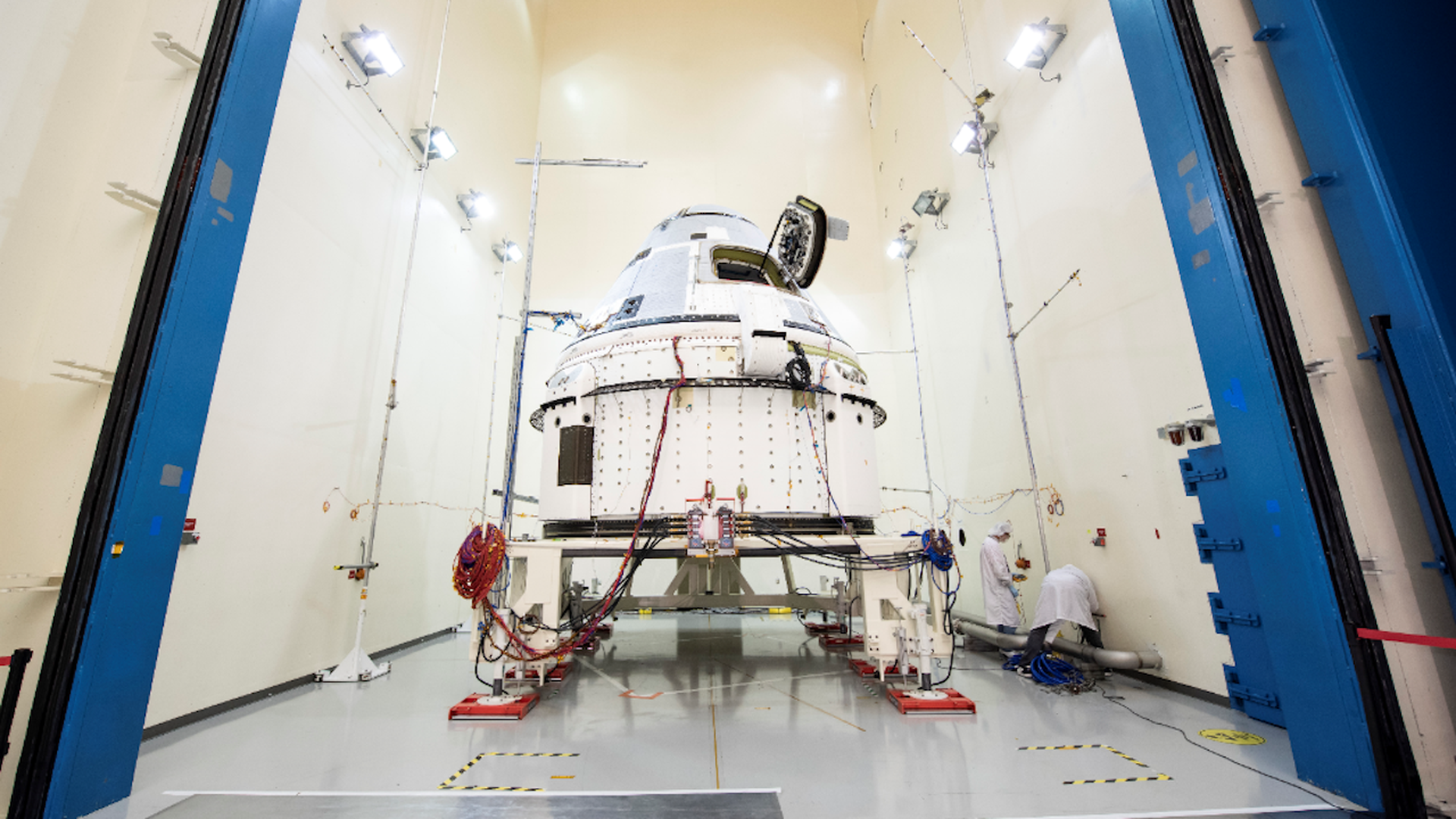 The CST-100 Starliner in a clean room at NASA.