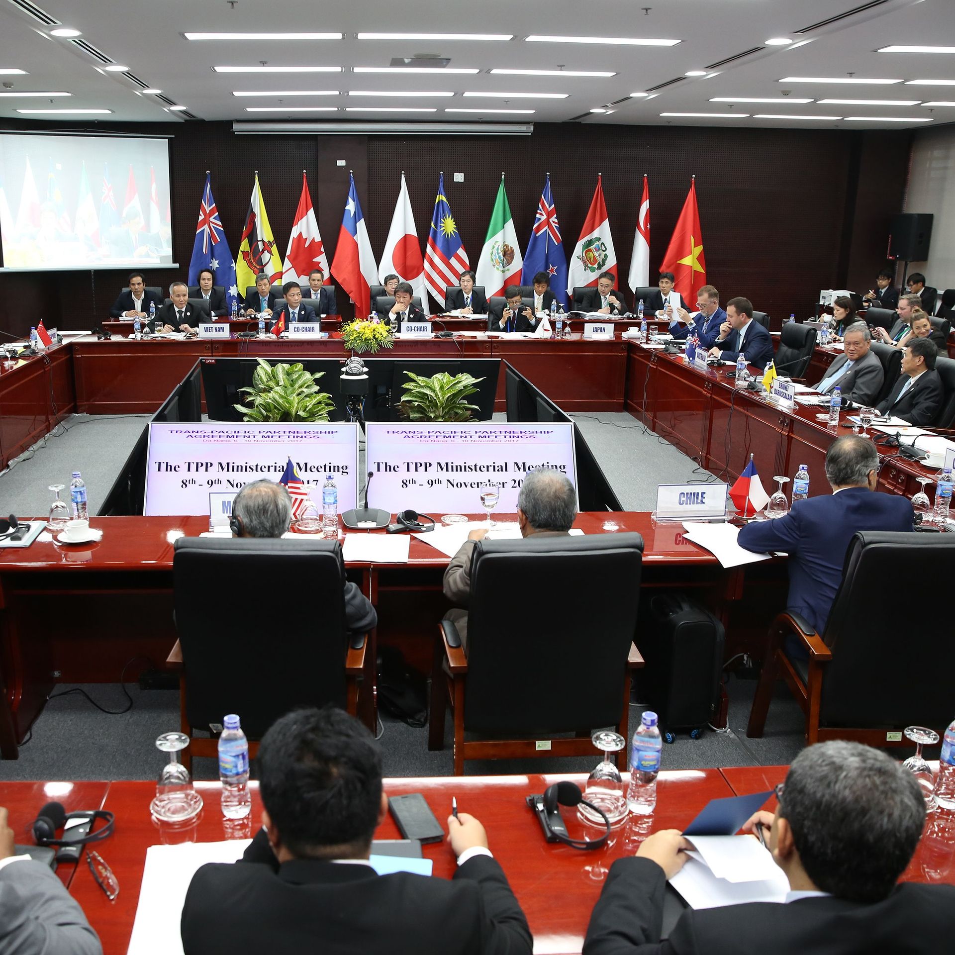 Asian trade delegates around a conference table