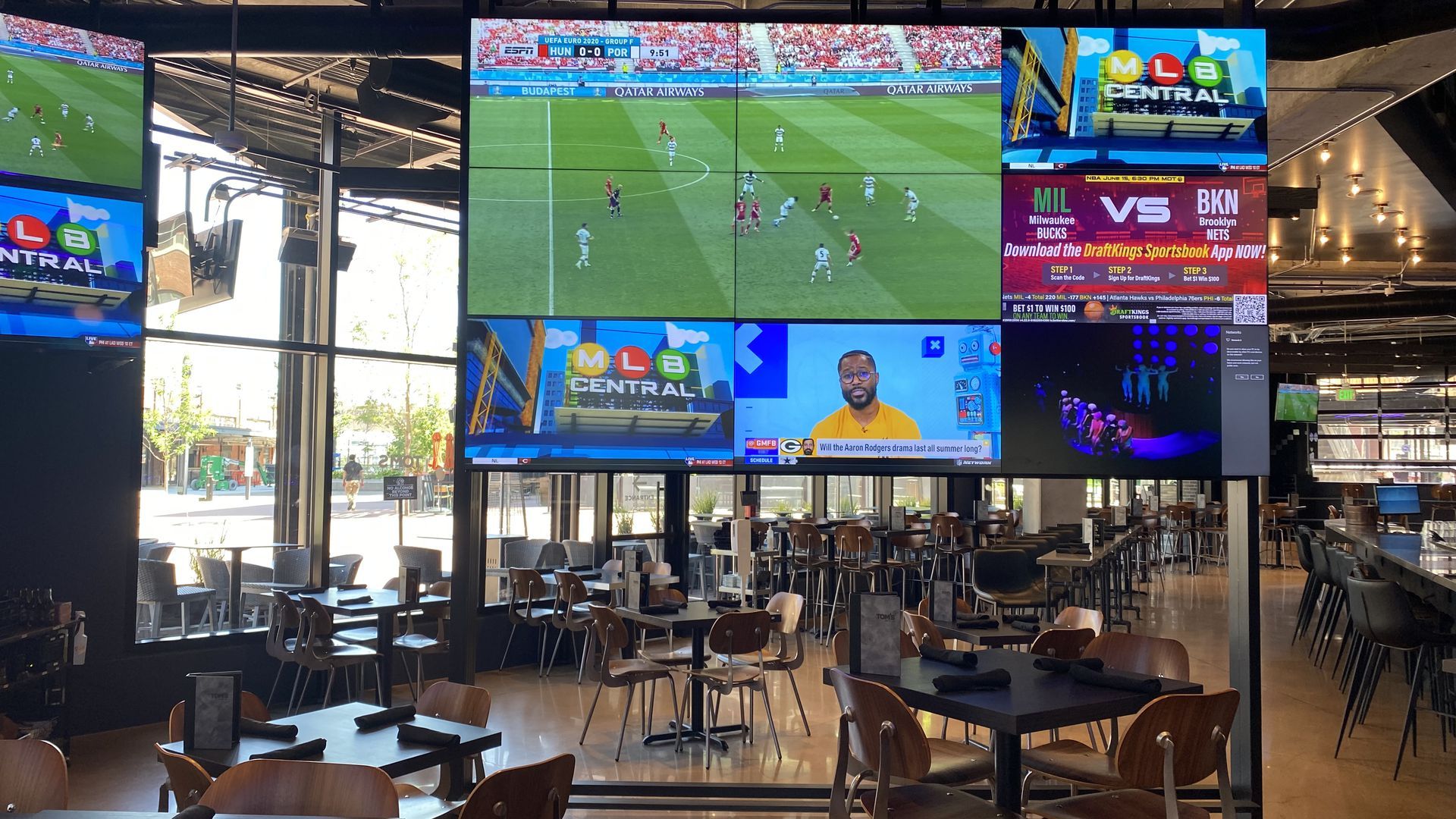 The interior of a sports bar, Tom's Watch Bar, in Denver.