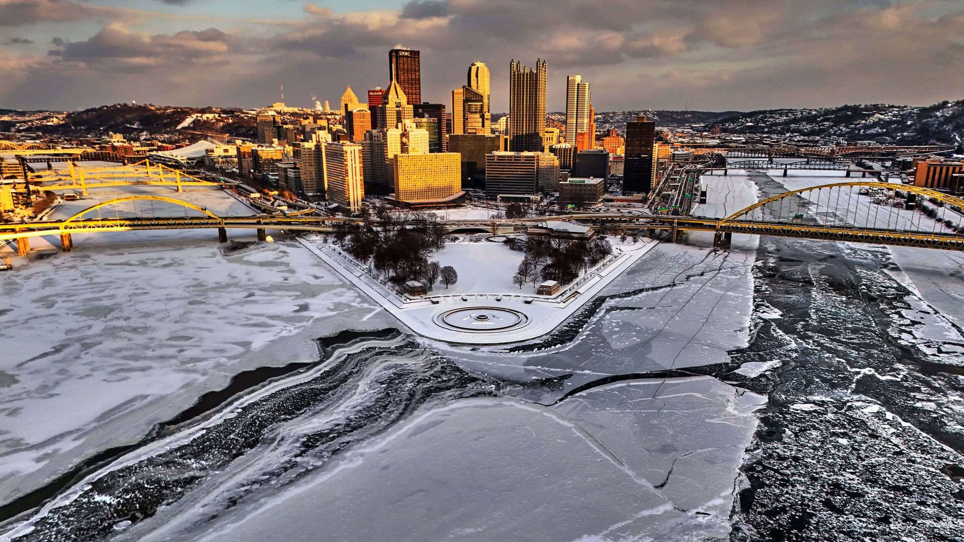 Ice covers the confluence of the Allegheny (left), Ohio (center) and Monongahela Rivers yesterday at Point State Park in downtown Pittsburgh. 