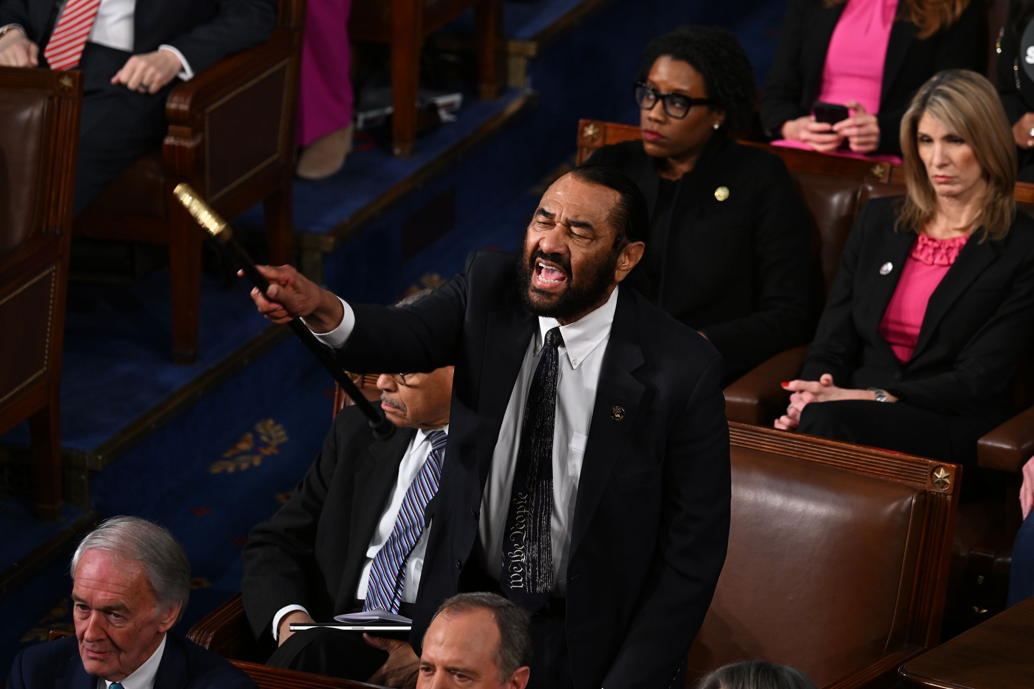 Rep. Al Green (D-Texas) yells from his seat as President Trump addresses a joint session of Congress.