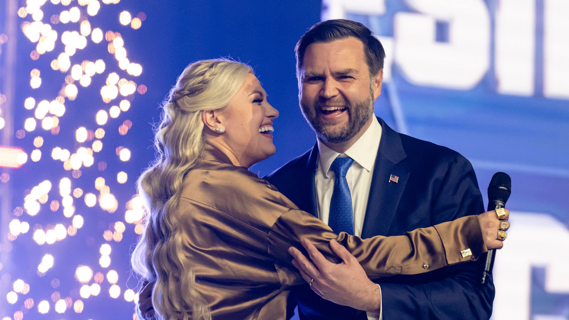 Erika Kirk greets Vice President JD Vance during Turning Point USA's AmericaFest 2025, Sunday, Dec. 21, 2025, in Phoenix. (AP Photo/Jon Cherry)