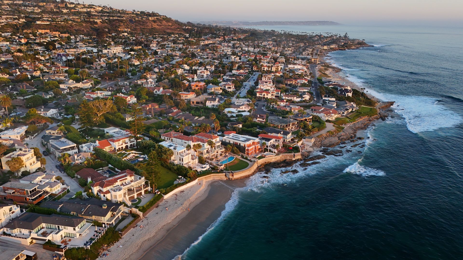 SAN DIEGO, CALIFORNIA - AUGUST 28: In an aerial view, luxury single-family homes and residential neighborhoods are seen along the coastal community of La Jolla on August 28, 2026 in San Diego, CA. (Photo by Kevin Carter/Getty Images)