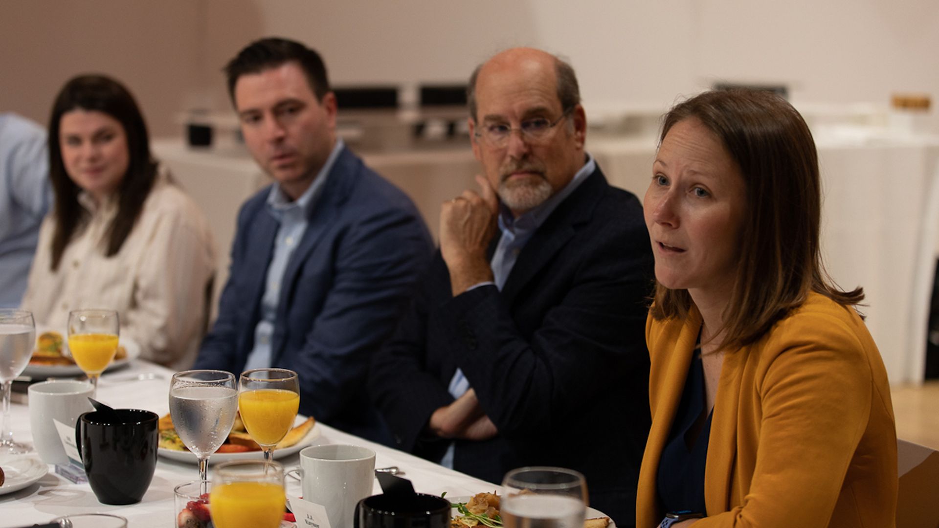 JJ Raynor, director of business development at Uber, speaks at the Climate Deals breakfast roundtable.