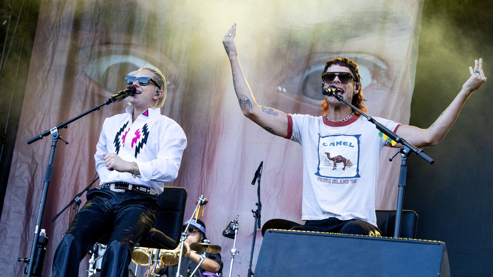 Two musicians performing. 