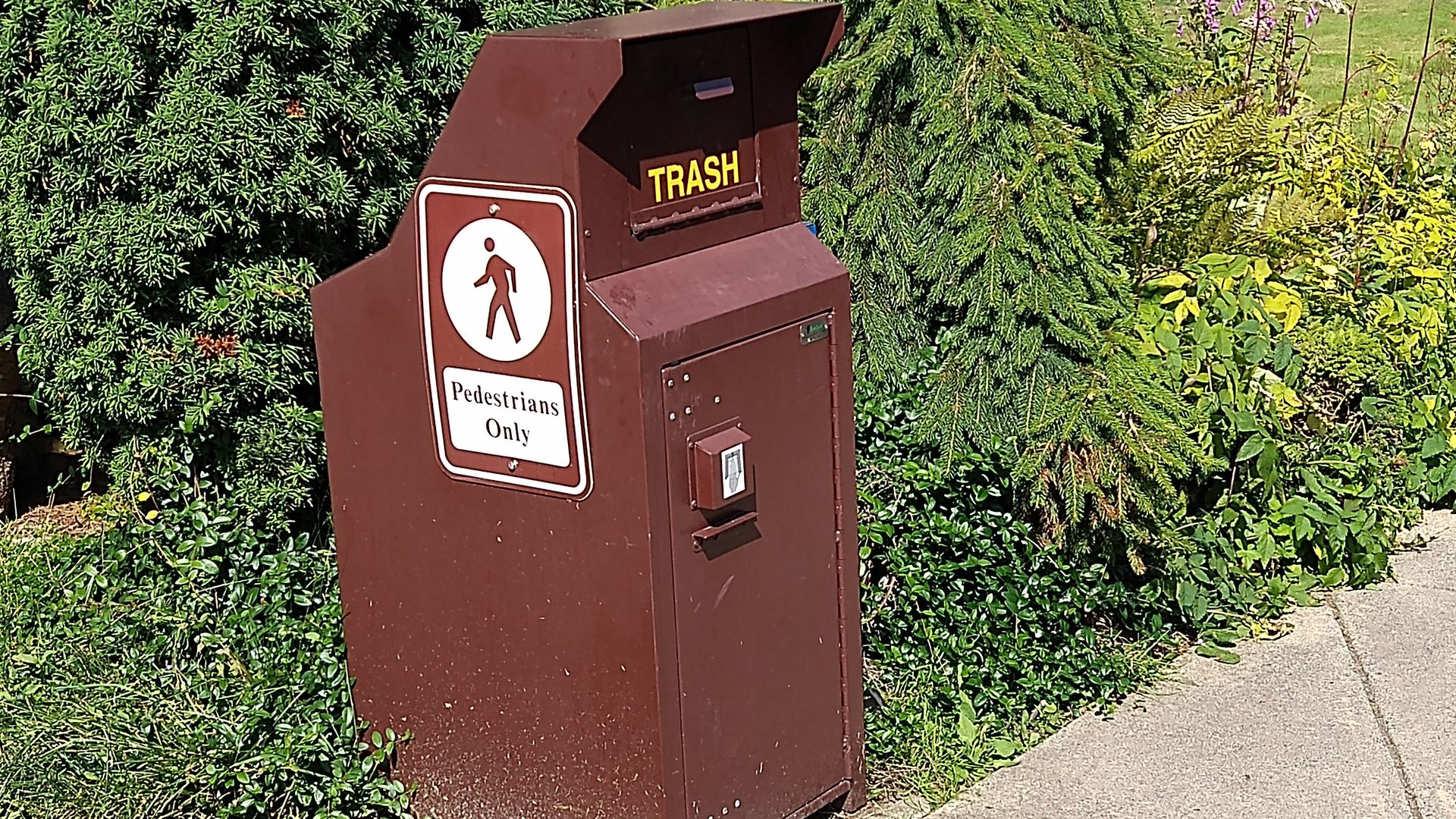 A trash can with a bear-proof latch