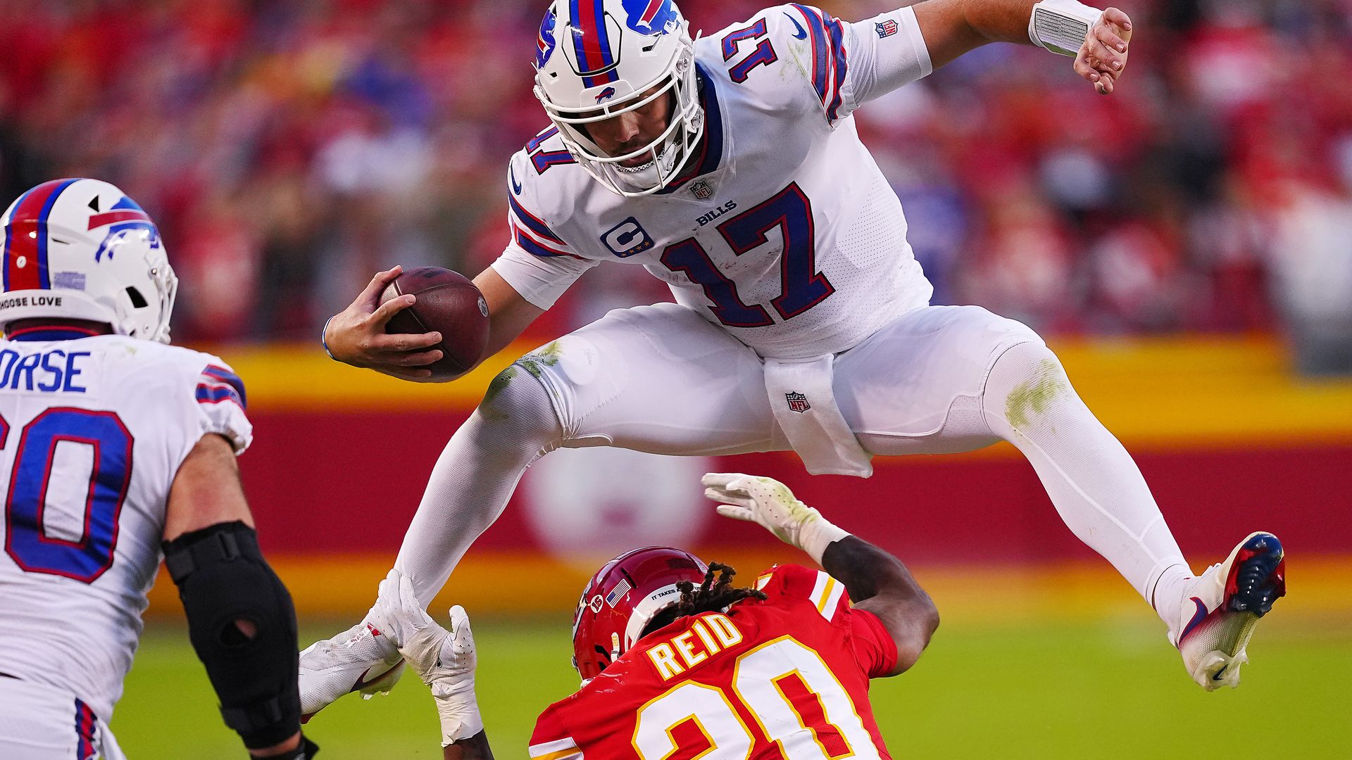 Josh Allen hurdles a defender