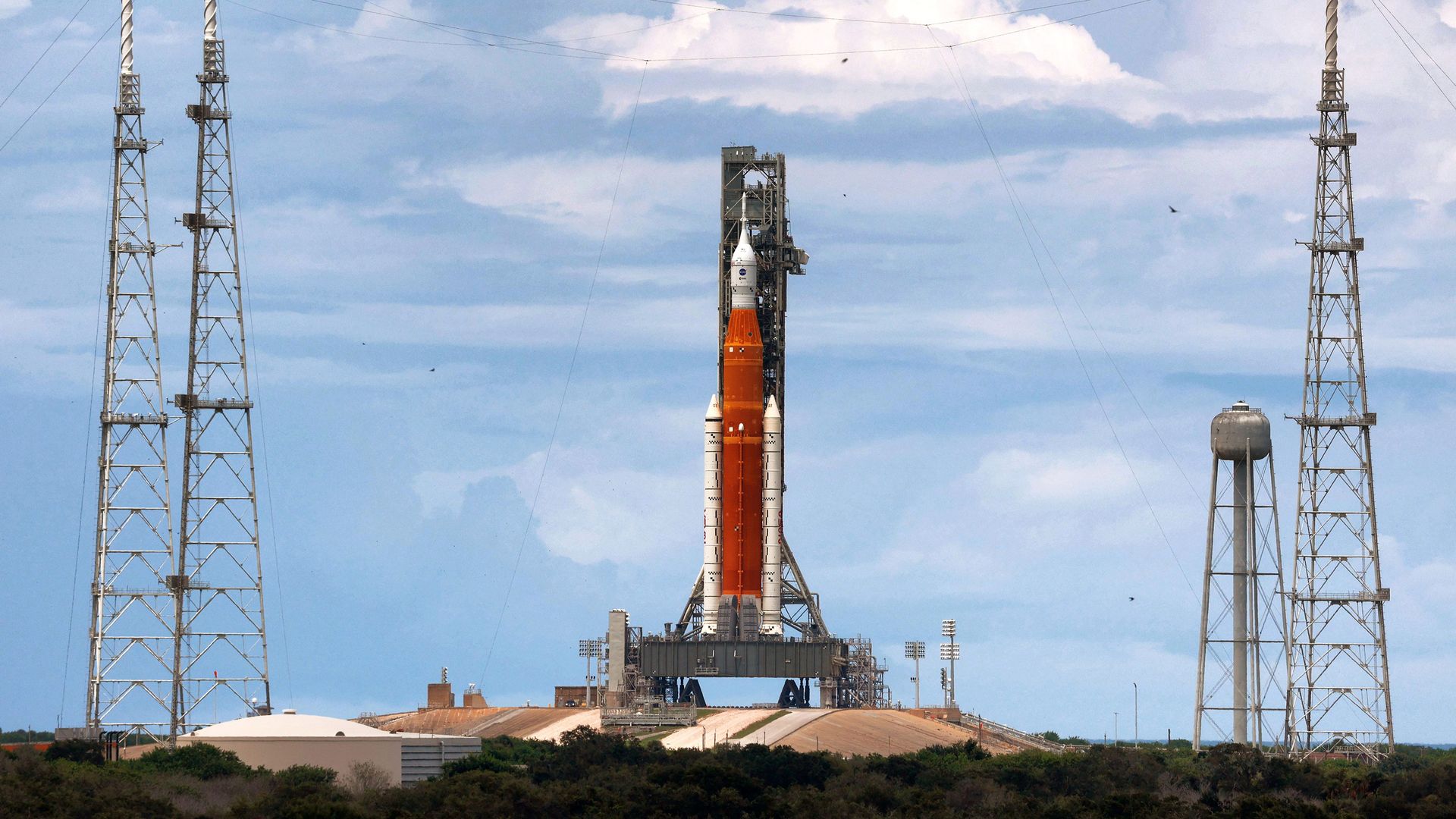 Artemis I, NASA's Space Launch System heavy-lift rocket carrying the Orion spacecraft, sits at Launch Pad 39-B at Kennedy Space Center, Florida. 