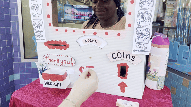A gif of a person putting in a coin into a doodle booth and then getting a photo strip-like doodle back