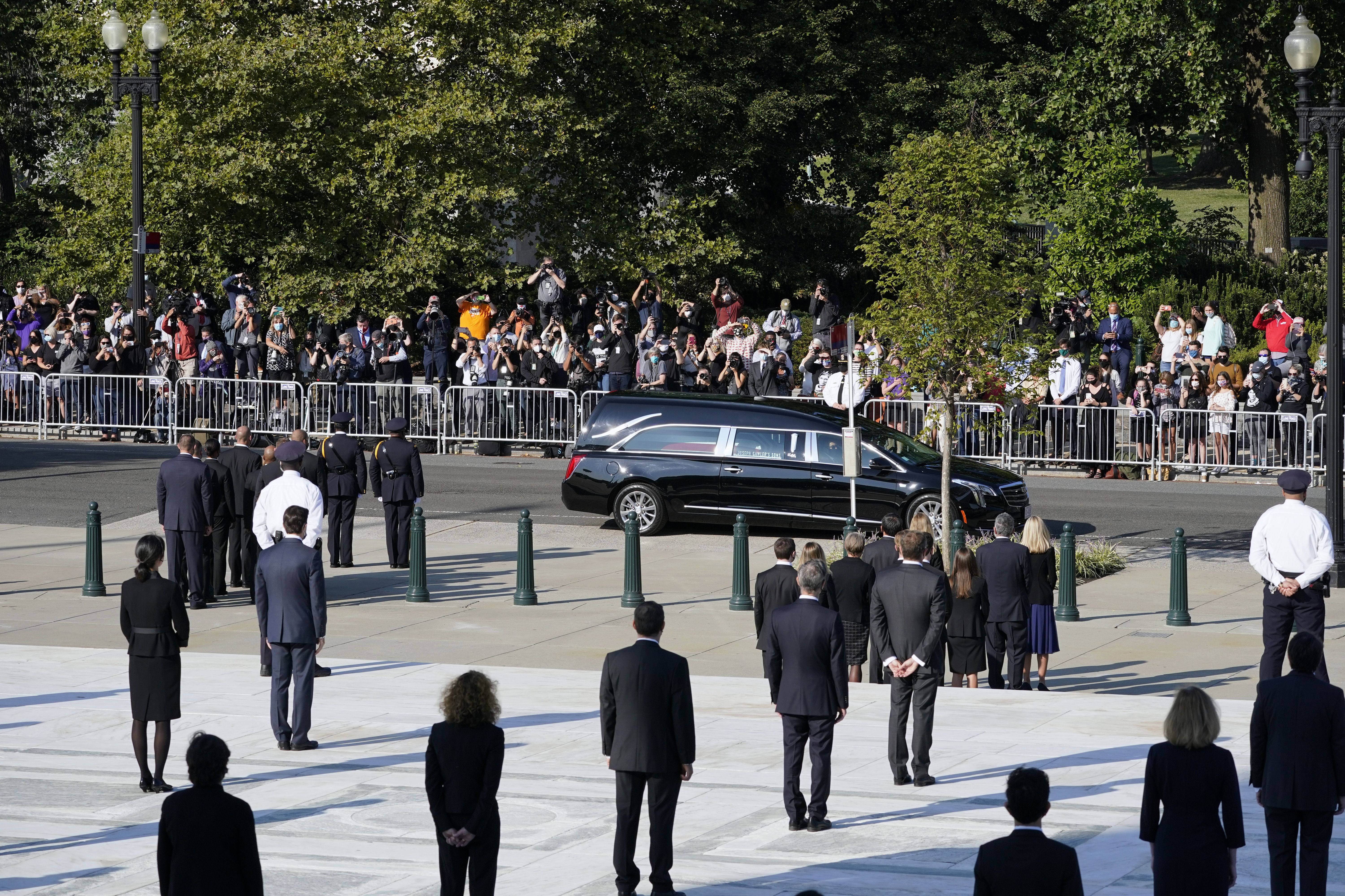 Crowds gather for Ruth Bader Ginsburg's hearse
