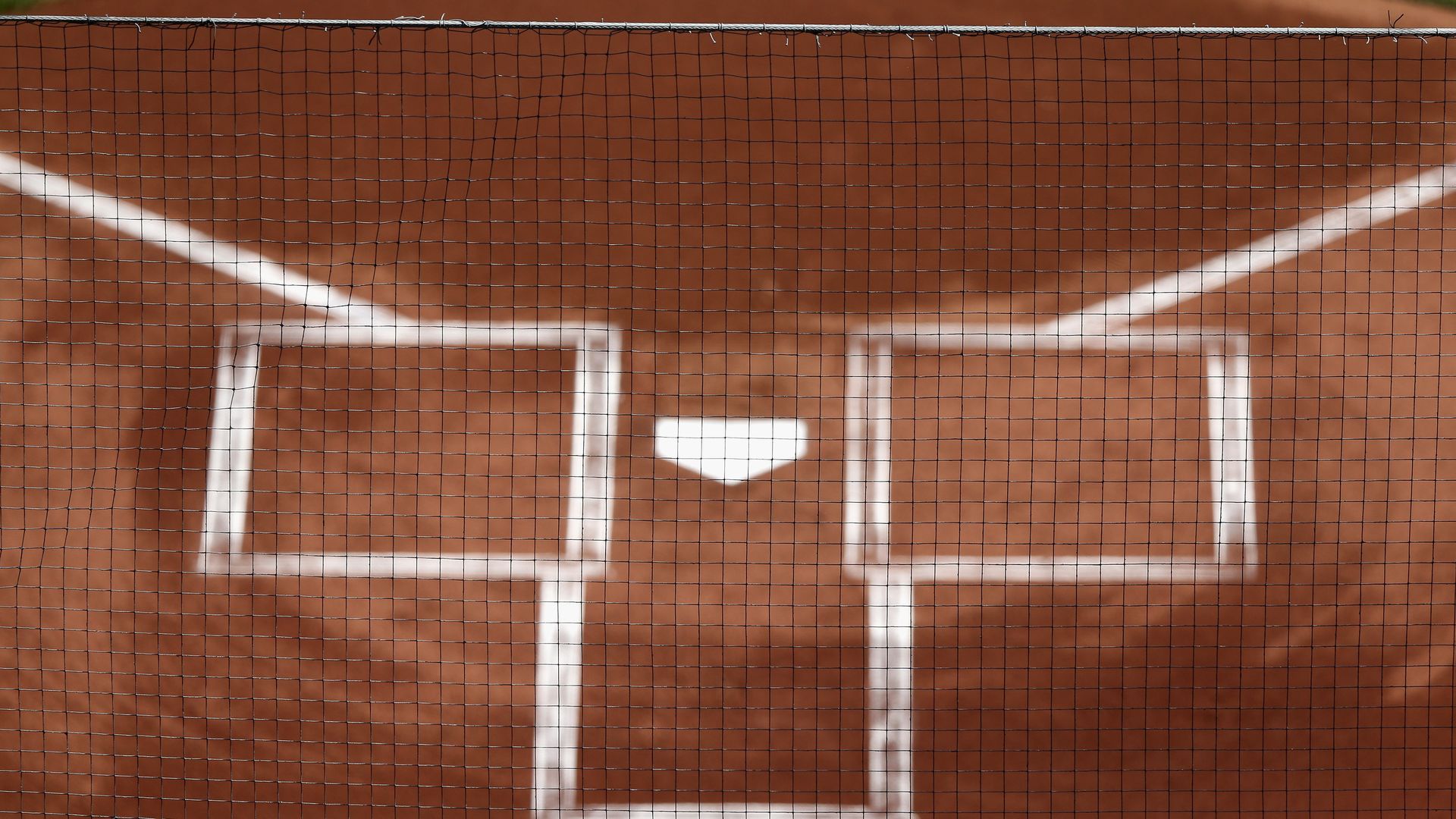 The extended netting behind home plate