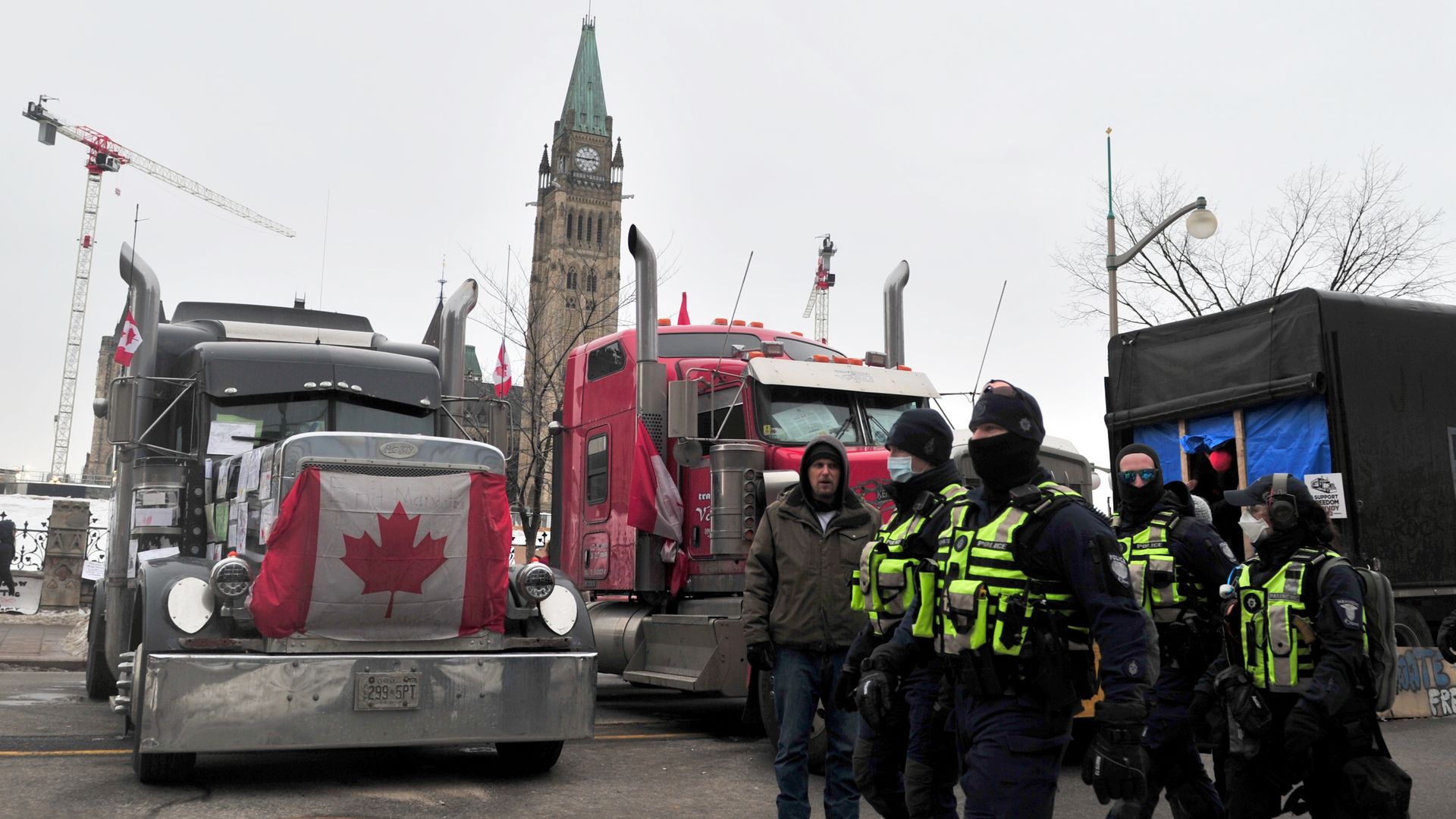 Police patrol near the parliament during a protest in Ottawa, Canada on February 11, 2022