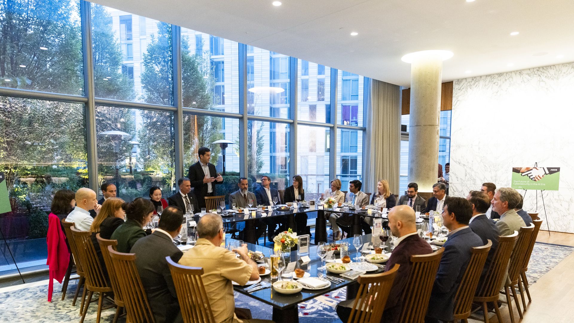 Attendees enjoyed dinner during the discussion.