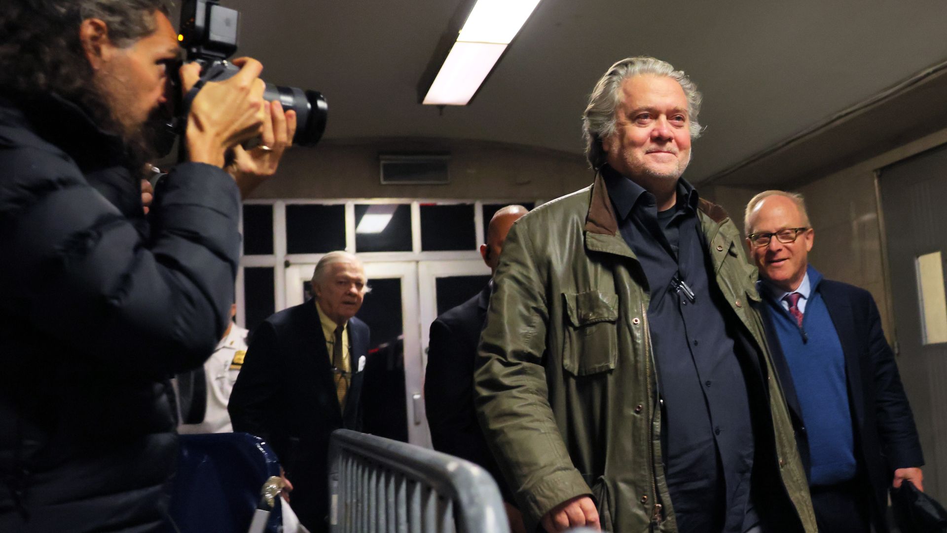 Steve Bannon walking and smiling