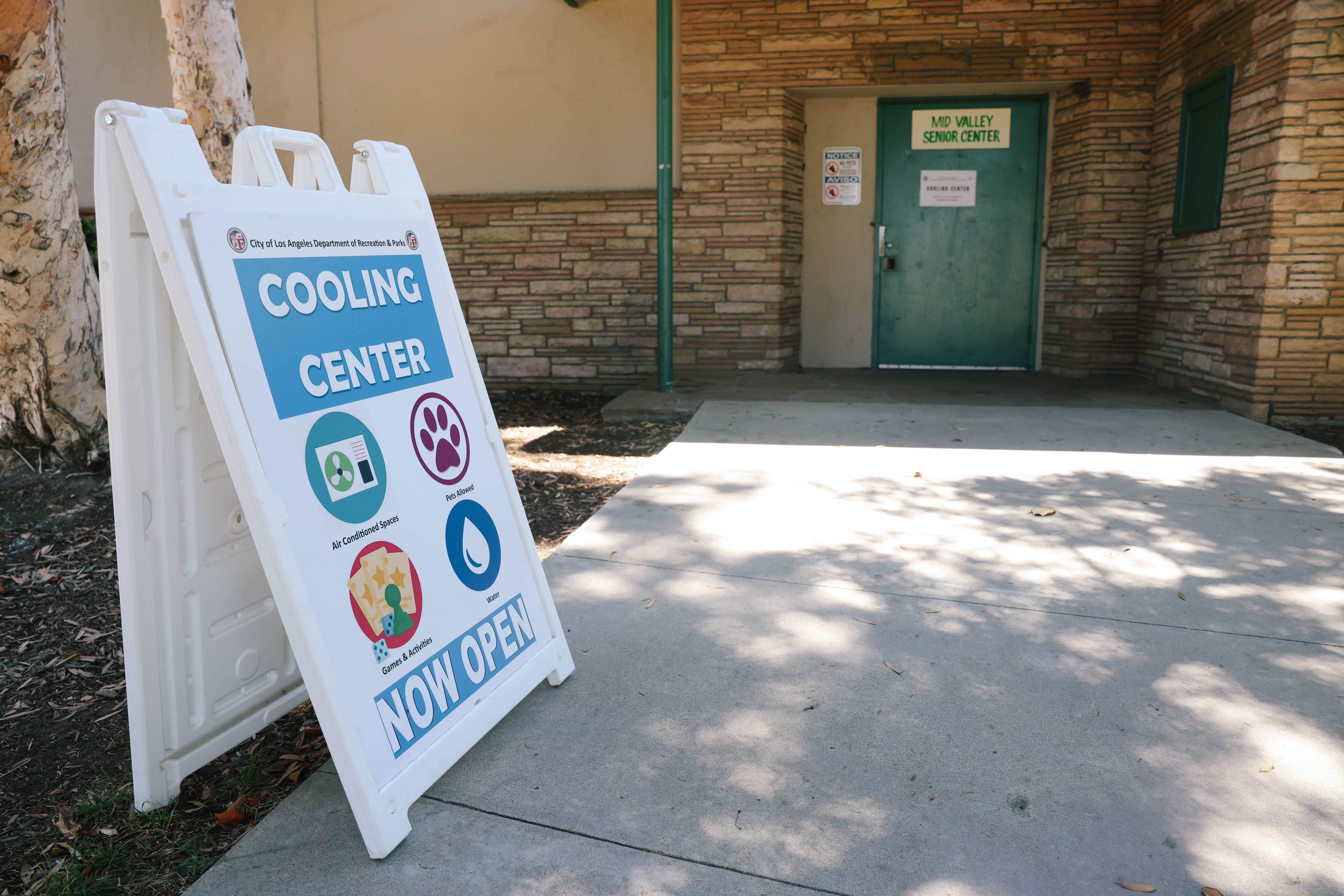 Signage directs people to an "augmented" cooling centers to help people escape the heat in what is expected to be an excessively hot Fourth of July weekend at the Mid-Valley Senior Citizen Center on Wednesday, July 3, 2024 in Panorama City, CA. 