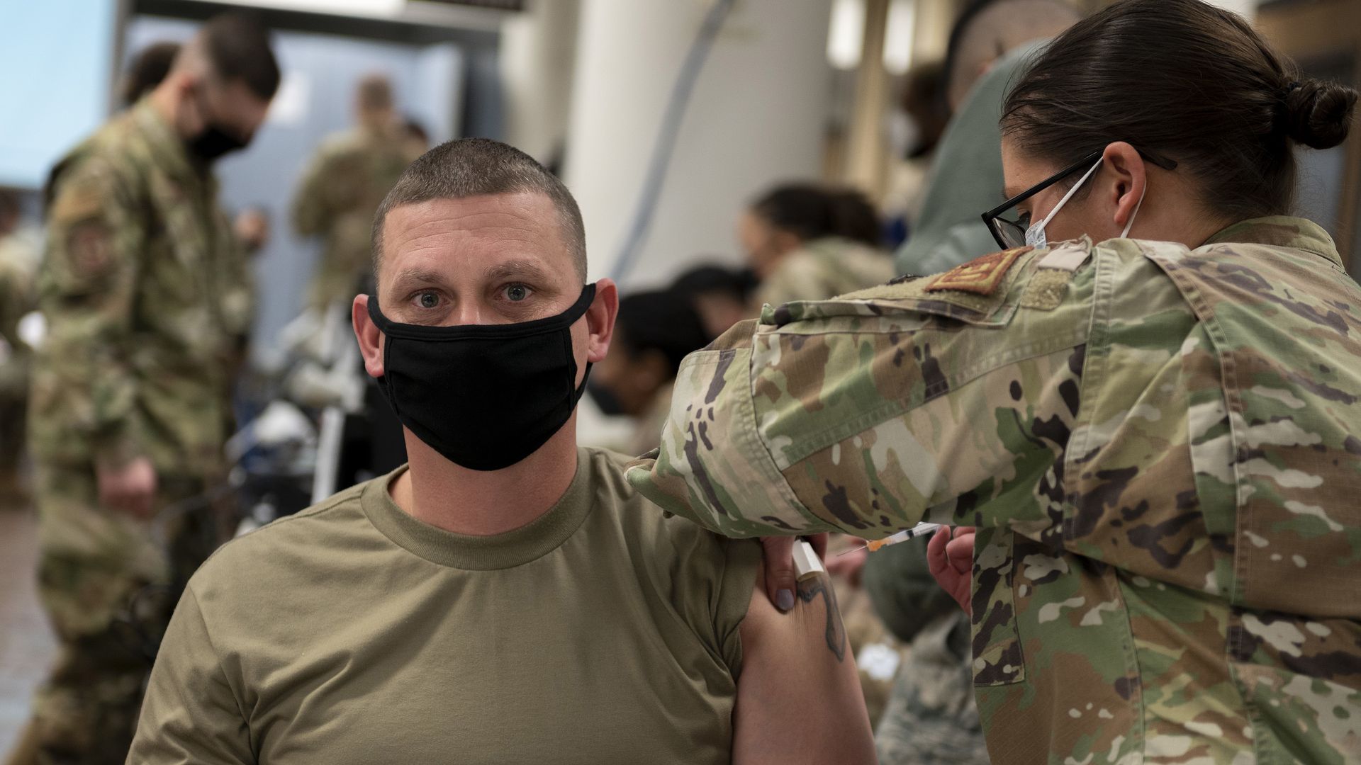 U.S. Air Force Sgt. receives a dose of the COVID-19 vaccine at Osan Air Base