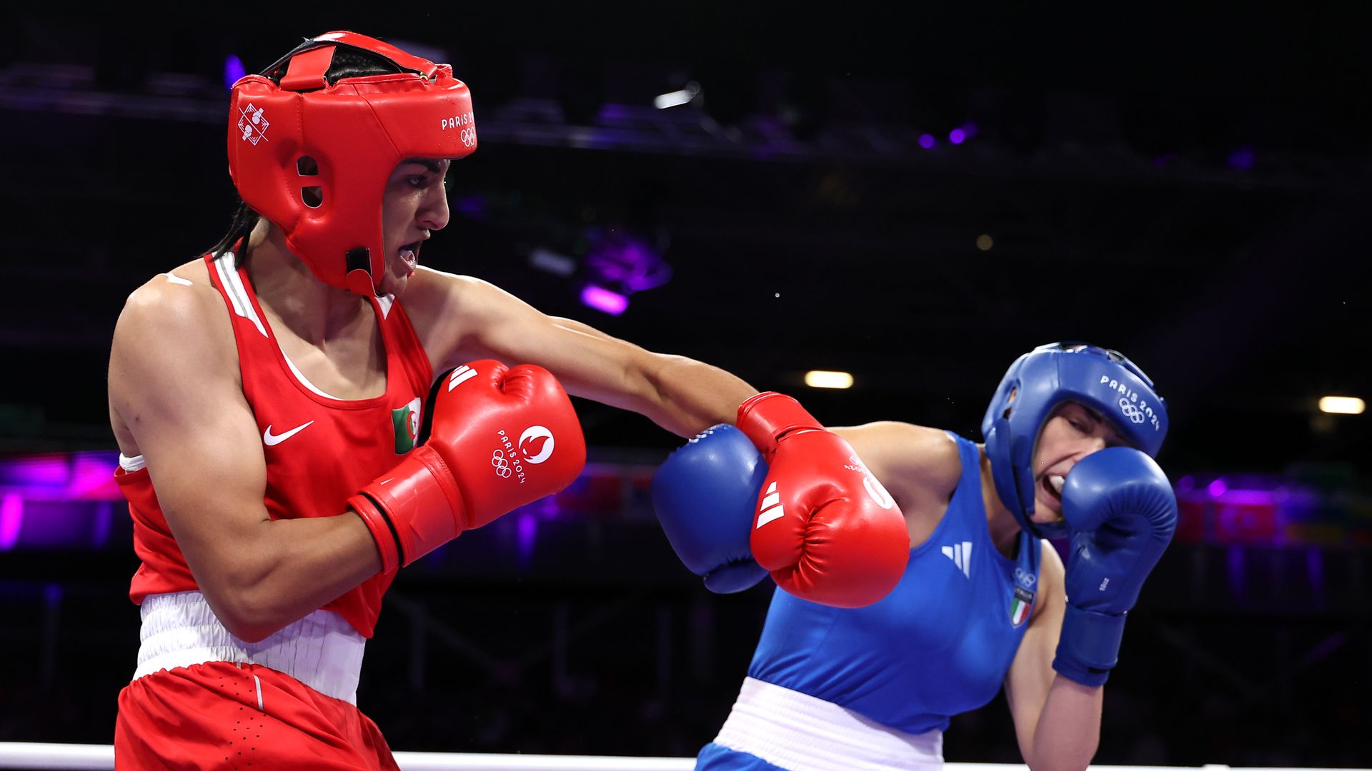 Imane Khelif of Team Algeria and Angela Carini of Team Italy exchange punches during the Women's 66kg preliminary round match on day six of the Olympic Games Paris 2024  on Aug. 1, 2024.
