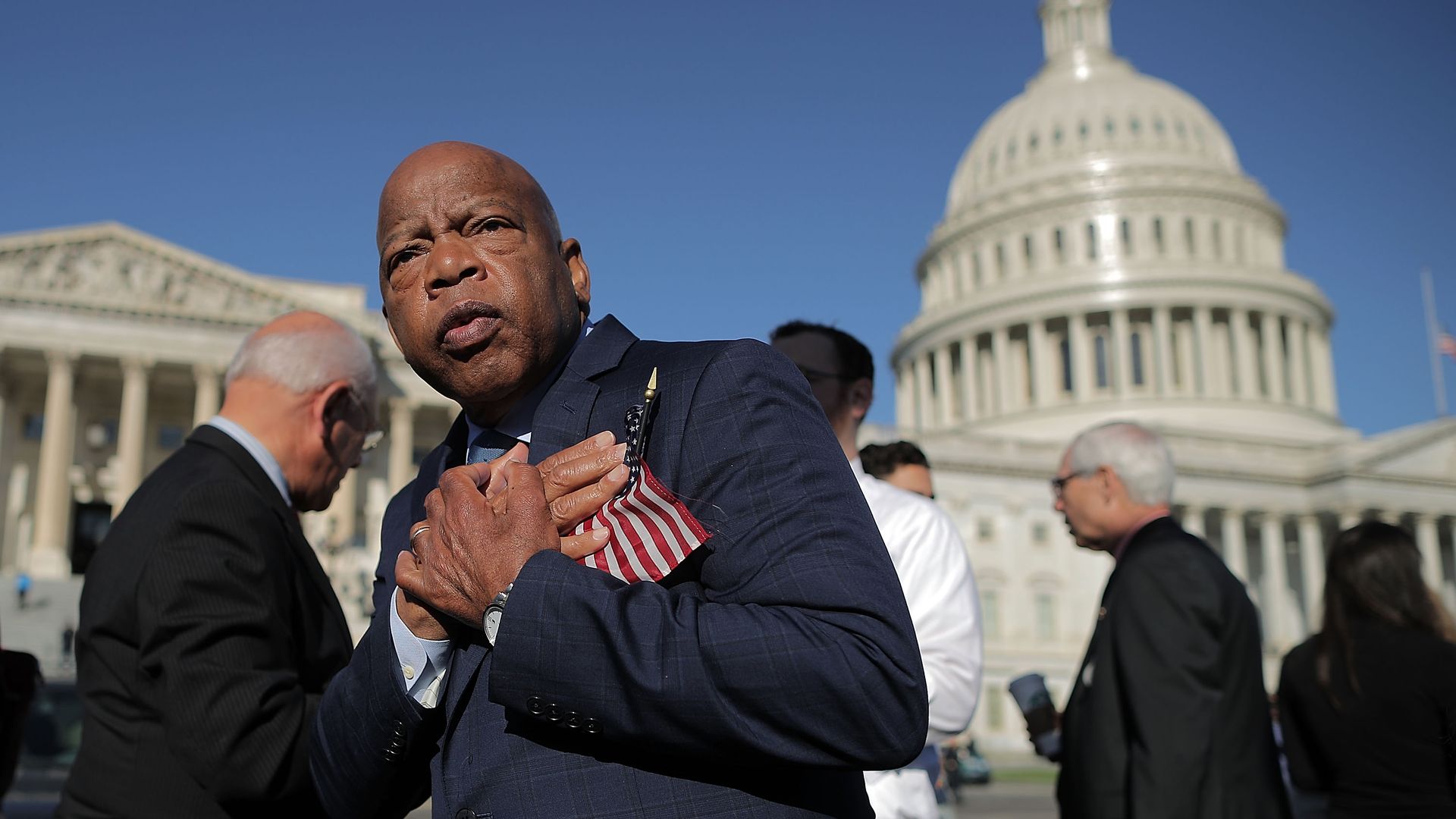 Rep. John Lewis standing in front of Capitol Hill