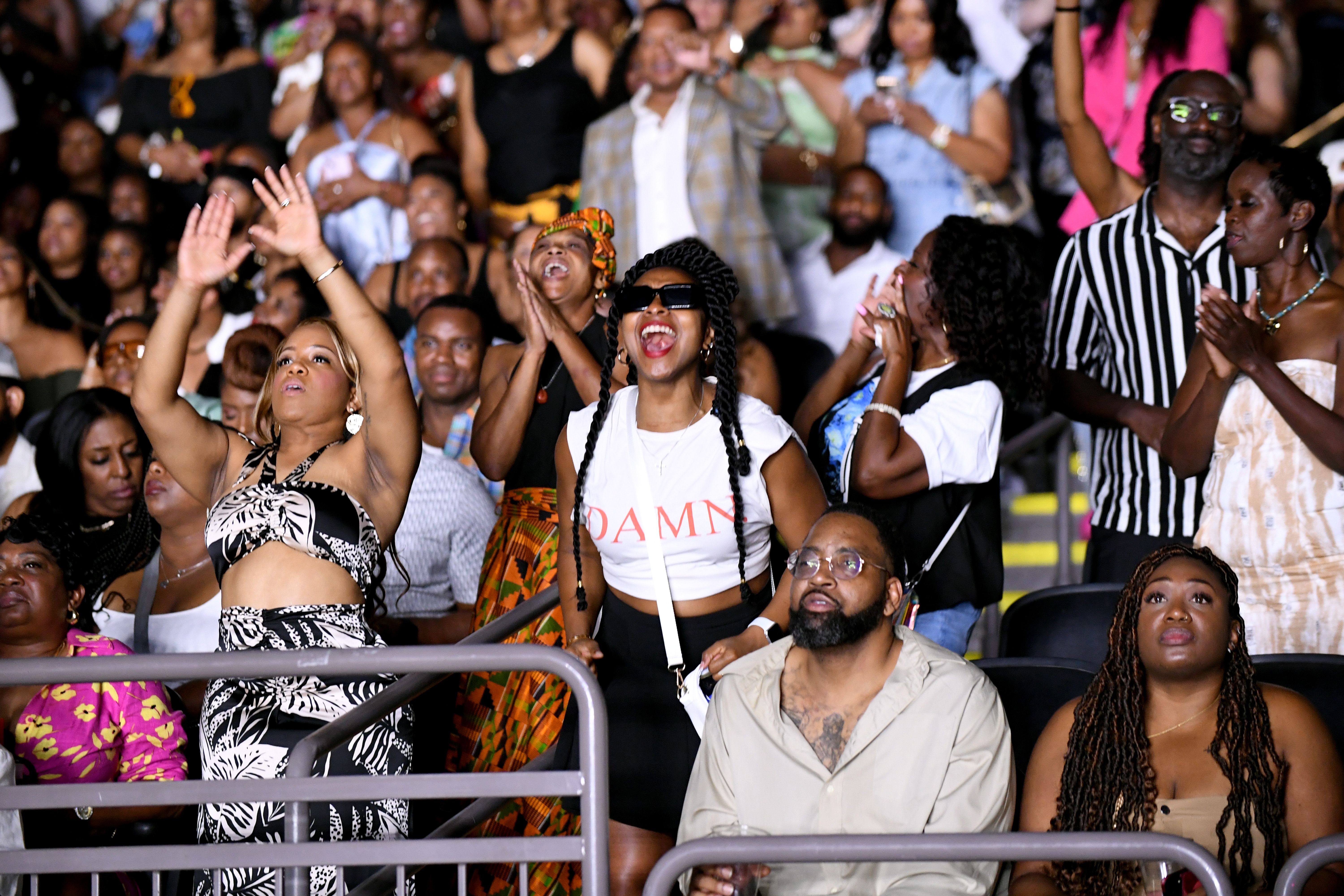 Photo shows the audience at the Superdome during Usher's show.