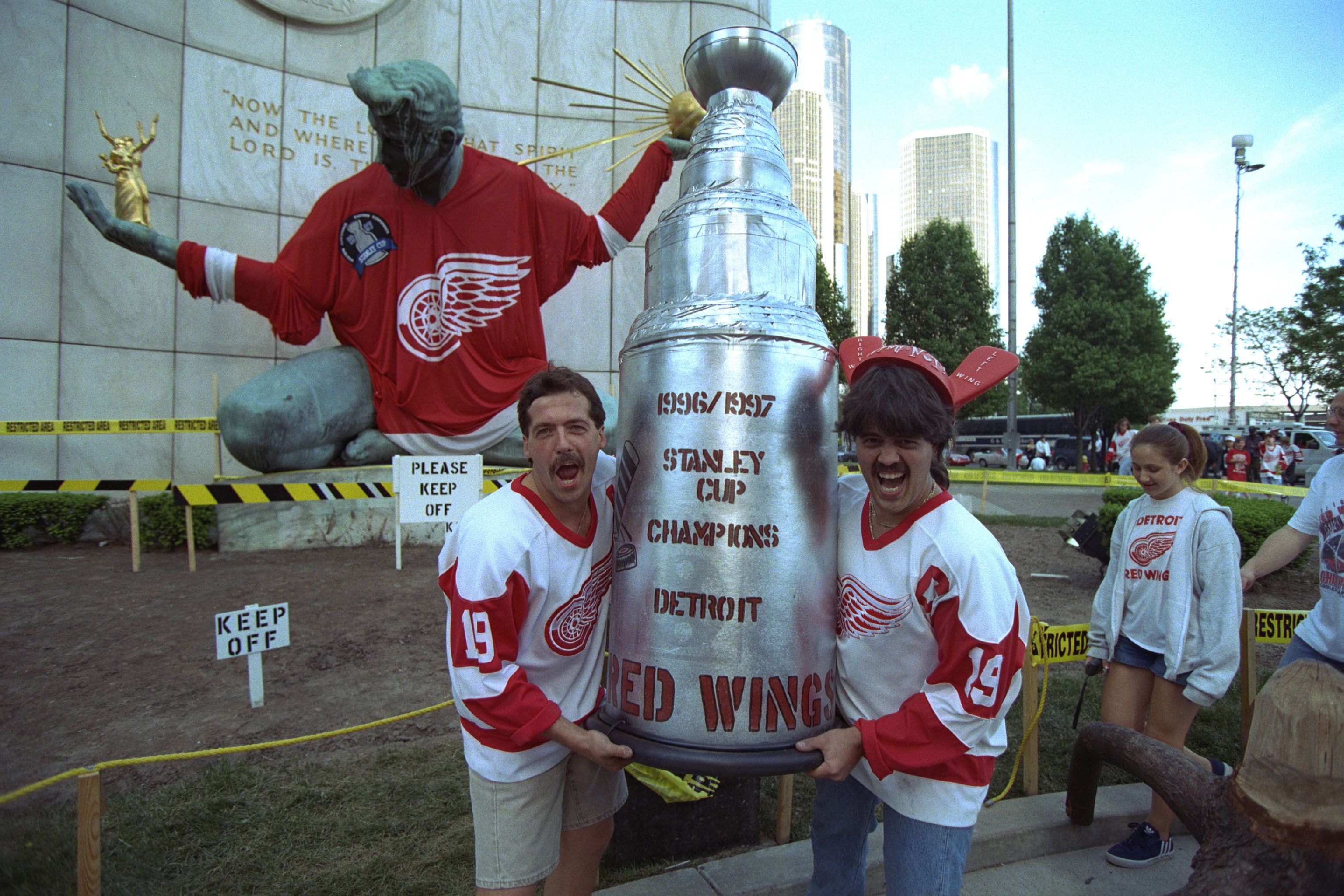 Detroit Red Wings fans celebrate the 1997 Stanley Cup Finals championship. The Red Wings beat the Flyers 2-1 in Detroit on June 7, 1997, to win their first league championship in 42 years. (Photo by Albert Dickson/Sporting News via Getty Images via Getty Images)