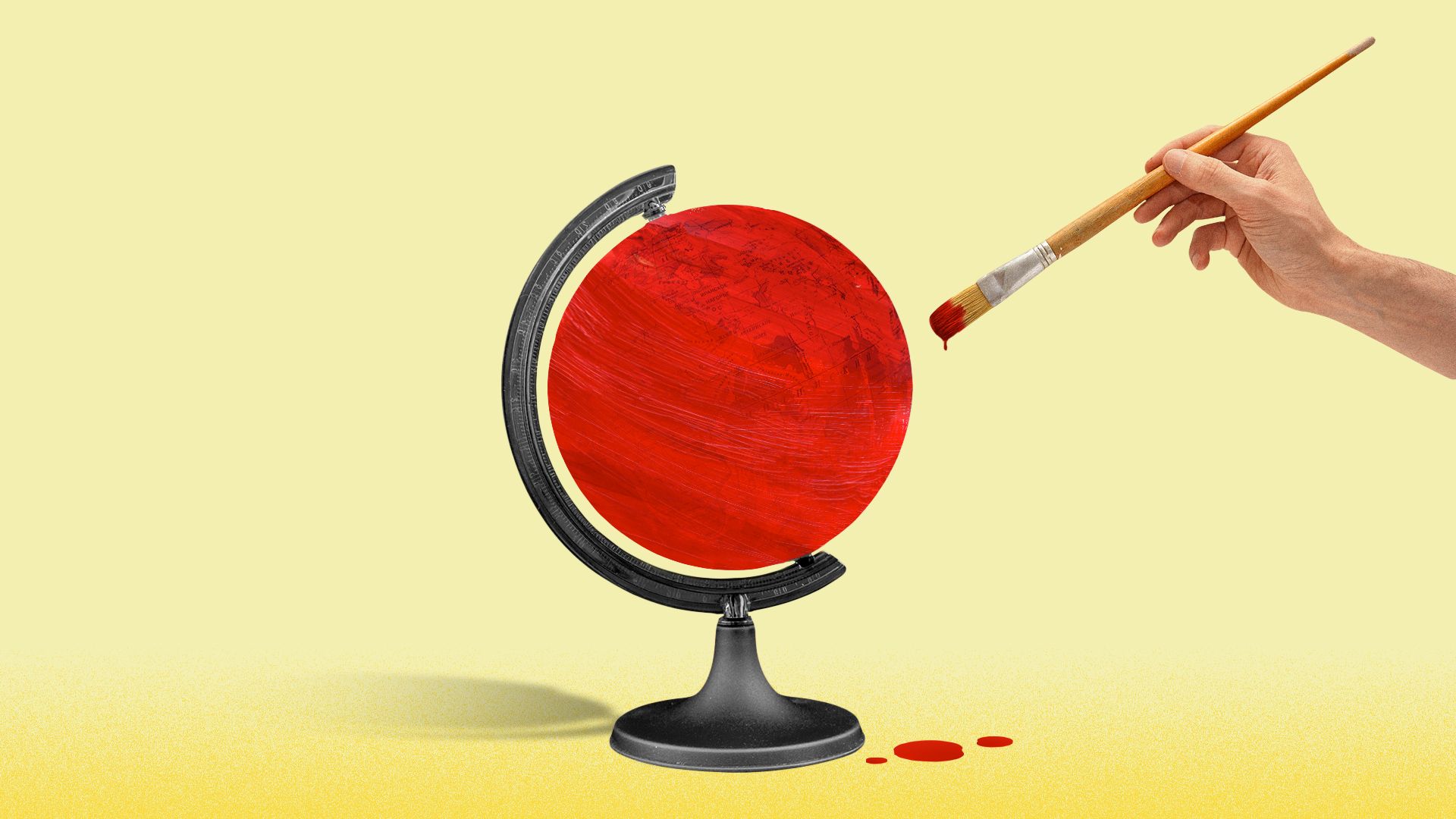 Illustration of a hand painting a globe red.