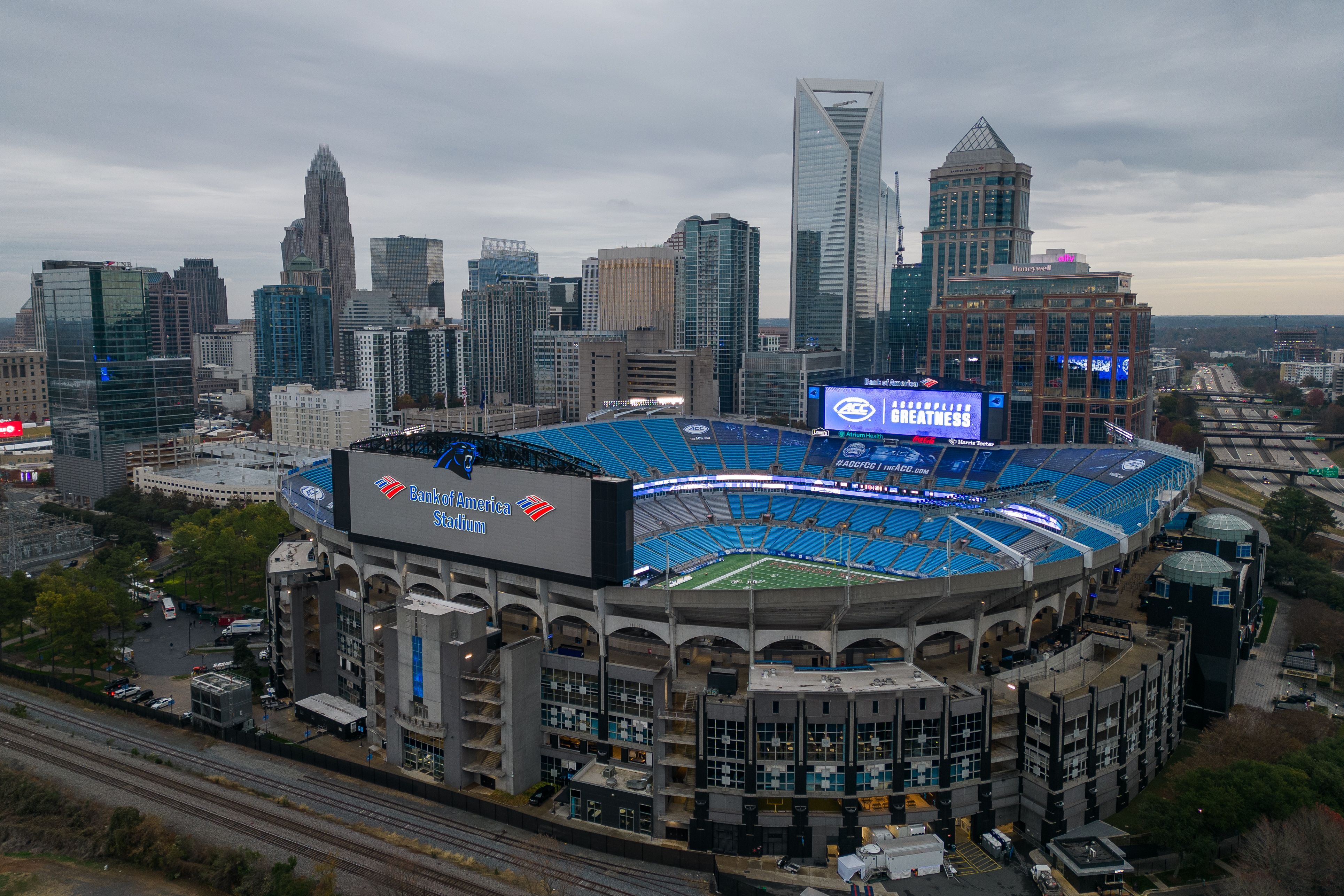 Bank of America Stadium with the Charlotte skyline in the background.