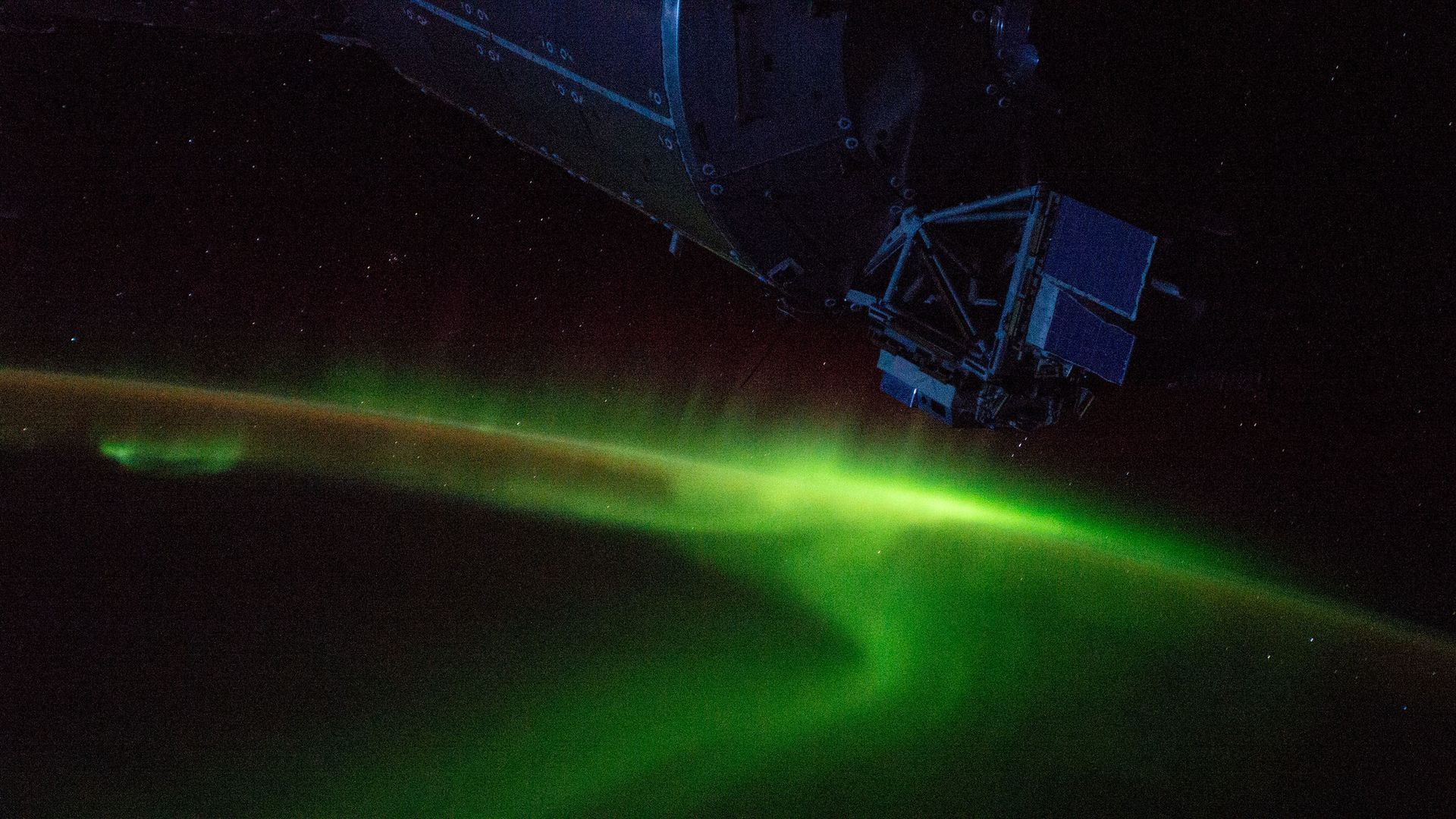 The International Space Station above the southern lights.