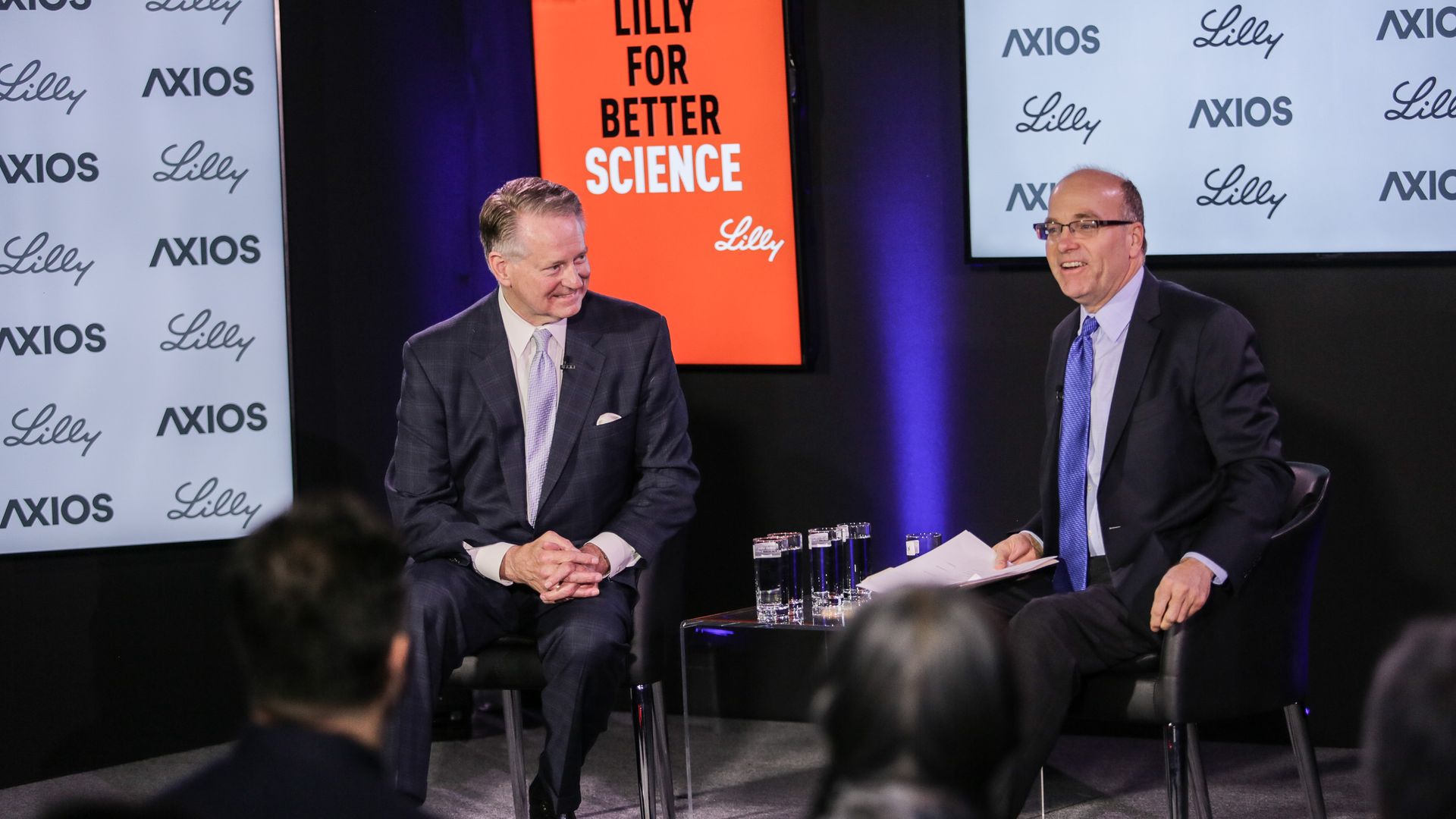 Mayor Steve Williams and Mike Allen sit on the Axios stage for an event.
