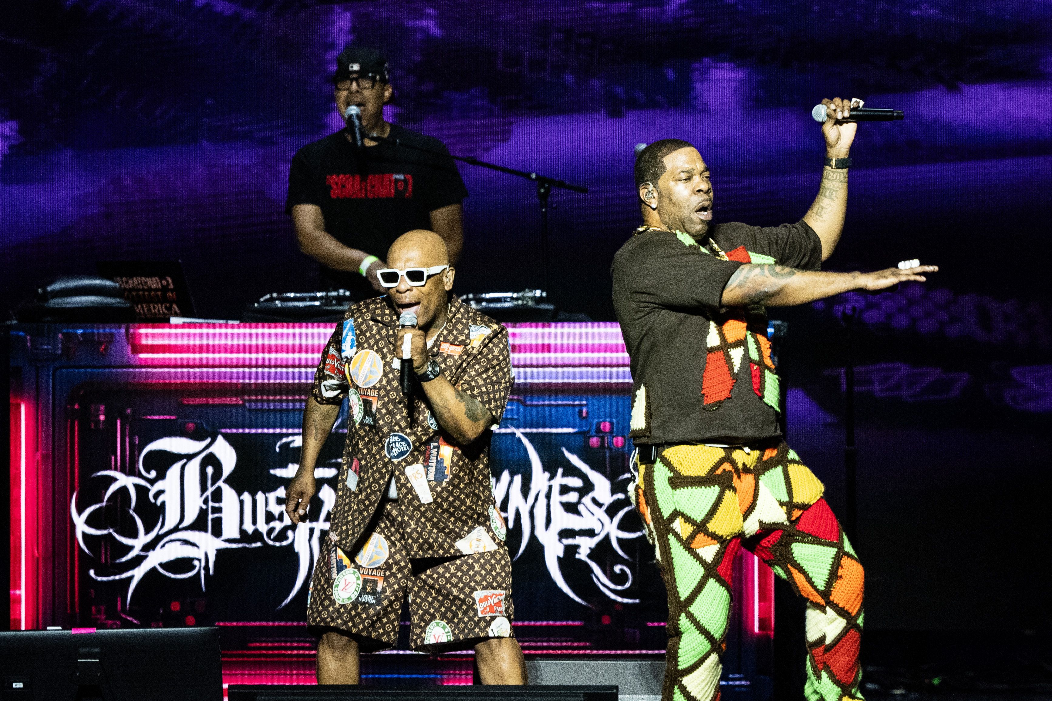 Photo shows Busta Rhymes on stage.